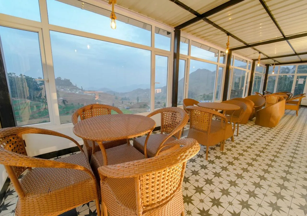 Balcony/Terrace in Silent Retreat Ooty Pool Resort by VOYE HOMES