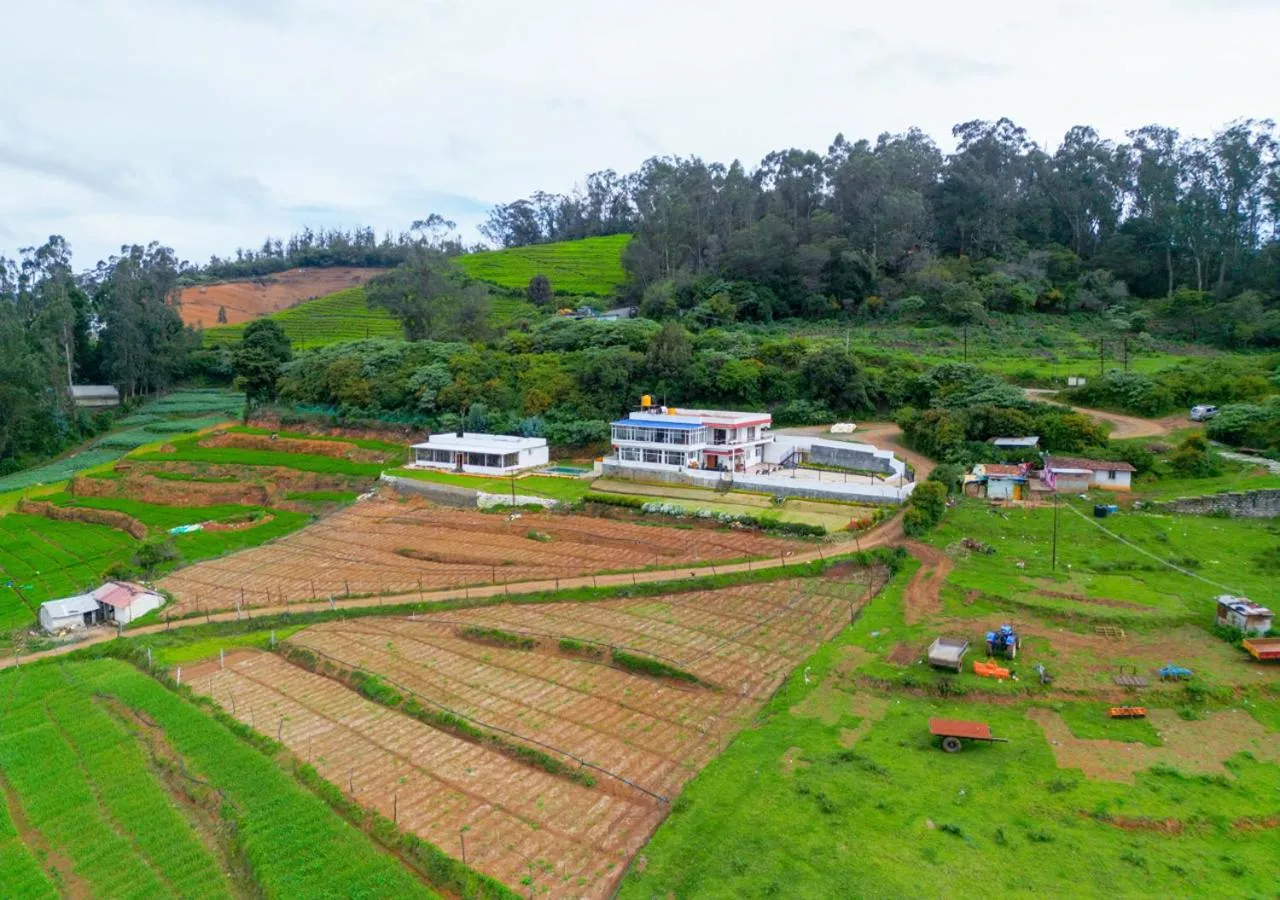 Property building in Silent Retreat Ooty Pool Resort by VOYE HOMES