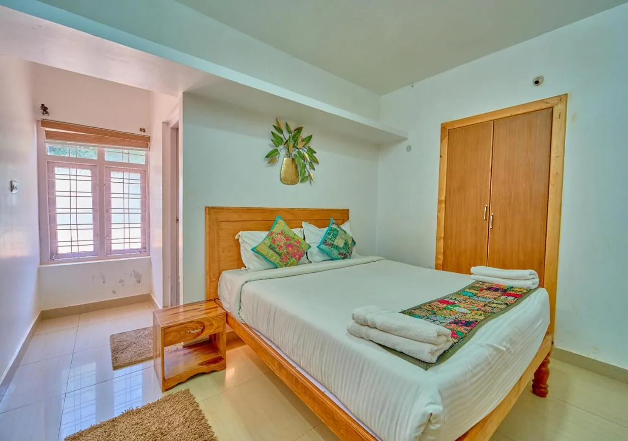 Photo of the whole room, Bed in Silent Retreat Ooty Pool Resort by VOYE HOMES