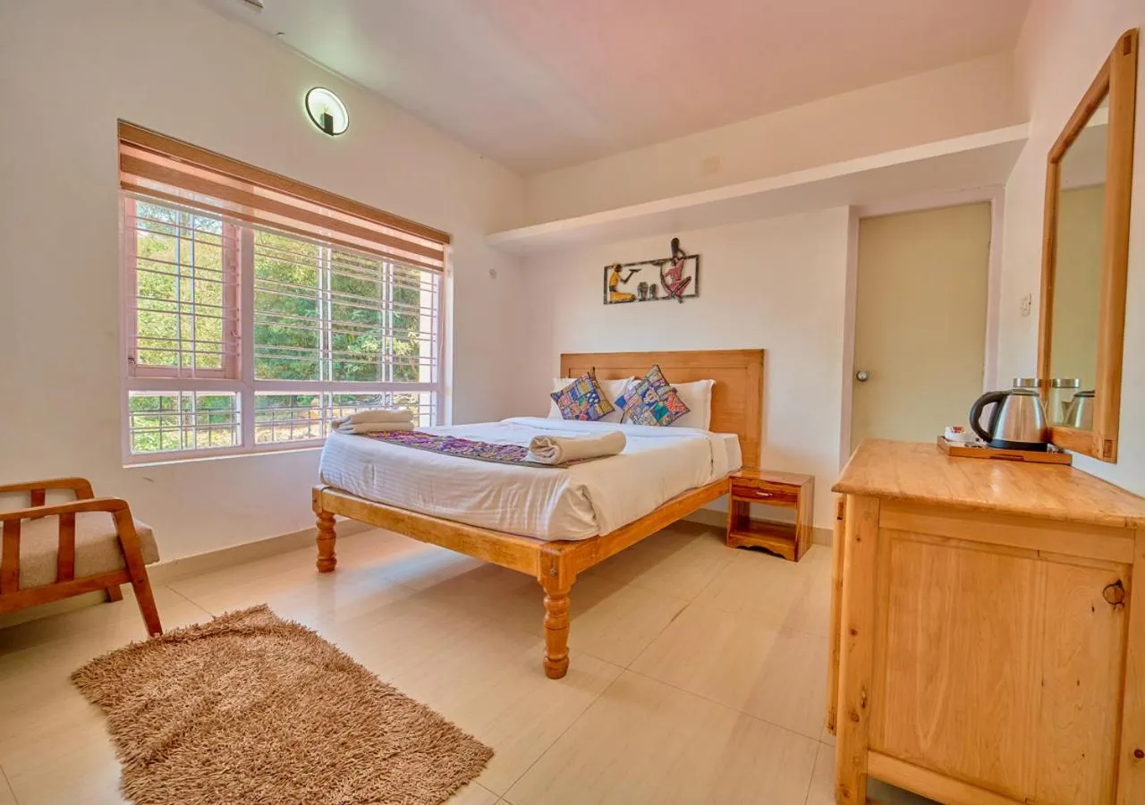 Photo of the whole room, Bed in Silent Retreat Ooty Pool Resort by VOYE HOMES