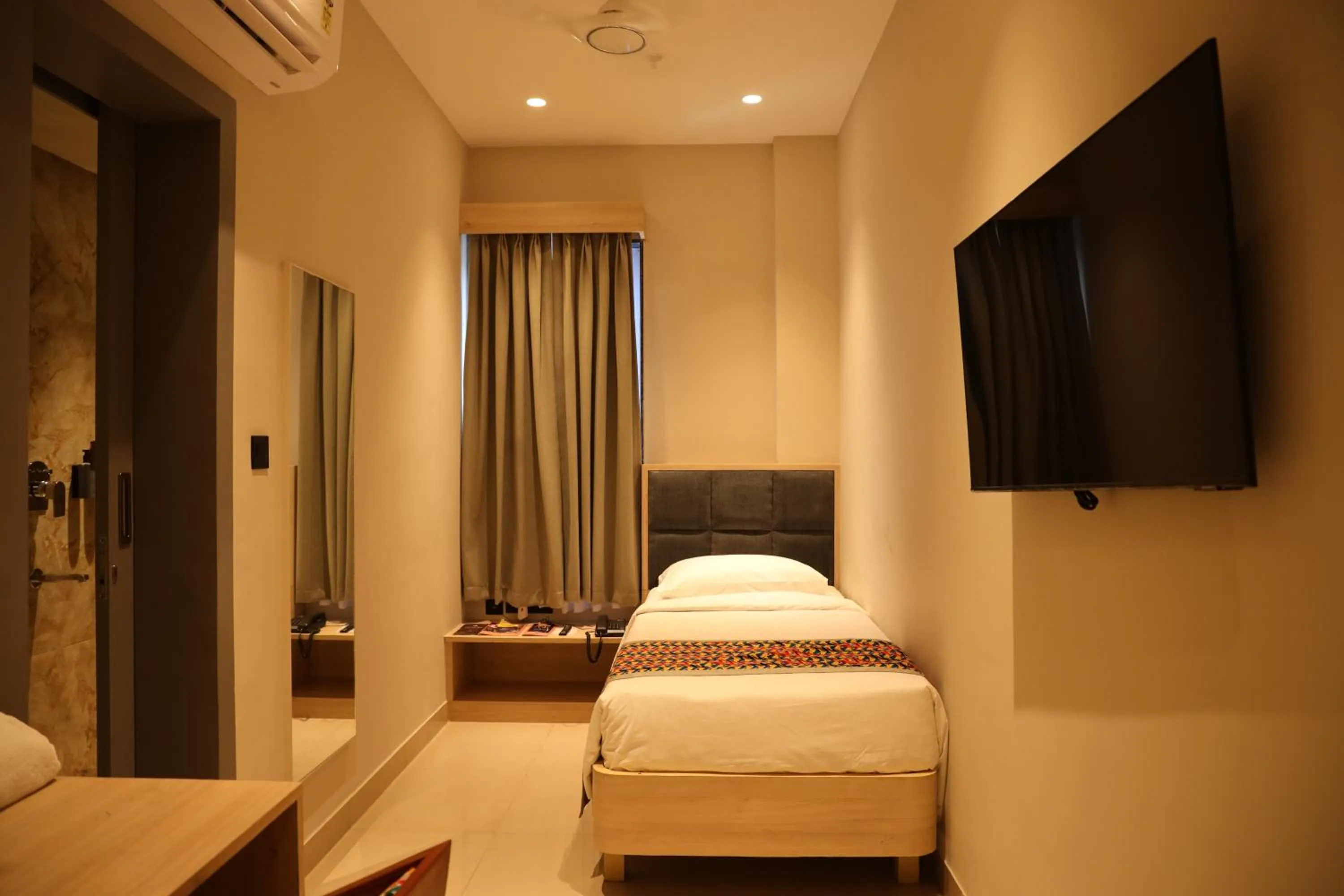 Bed in The Citi Residenci Hotel, Banskopa