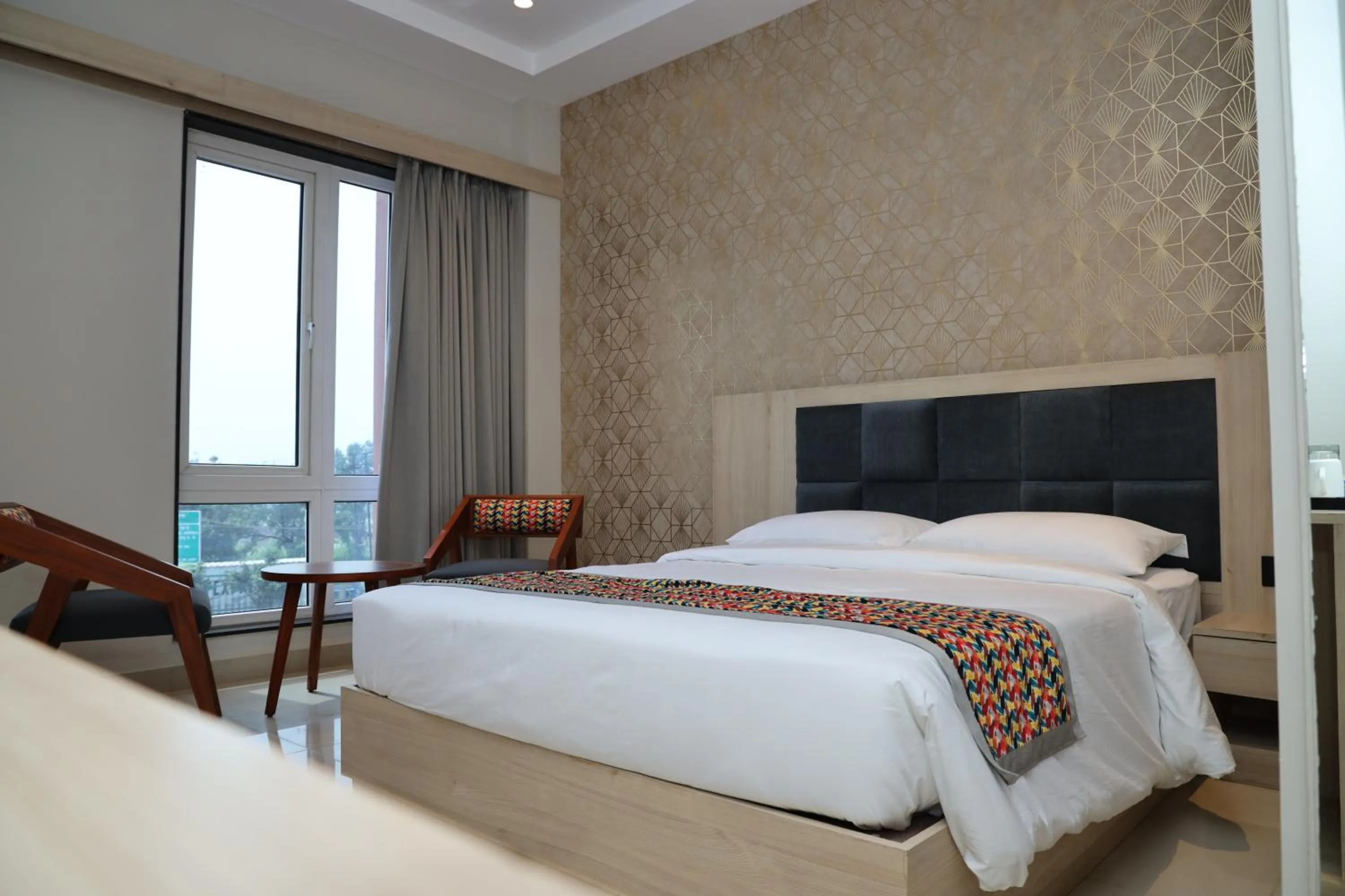 Bed in The Citi Residenci Hotel, Banskopa