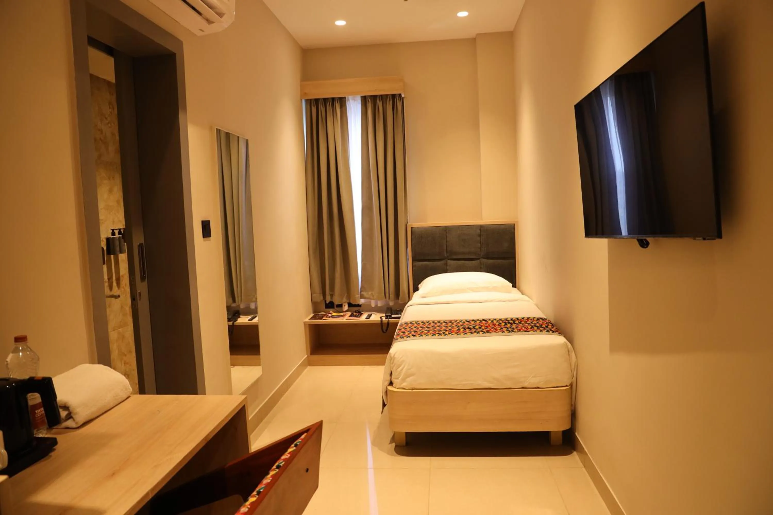 Bed in The Citi Residenci Hotel, Banskopa