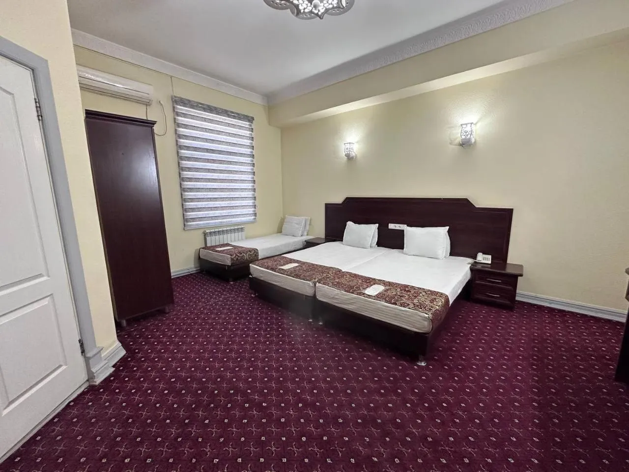 Photo of the whole room, Bed in Grand Silk Road