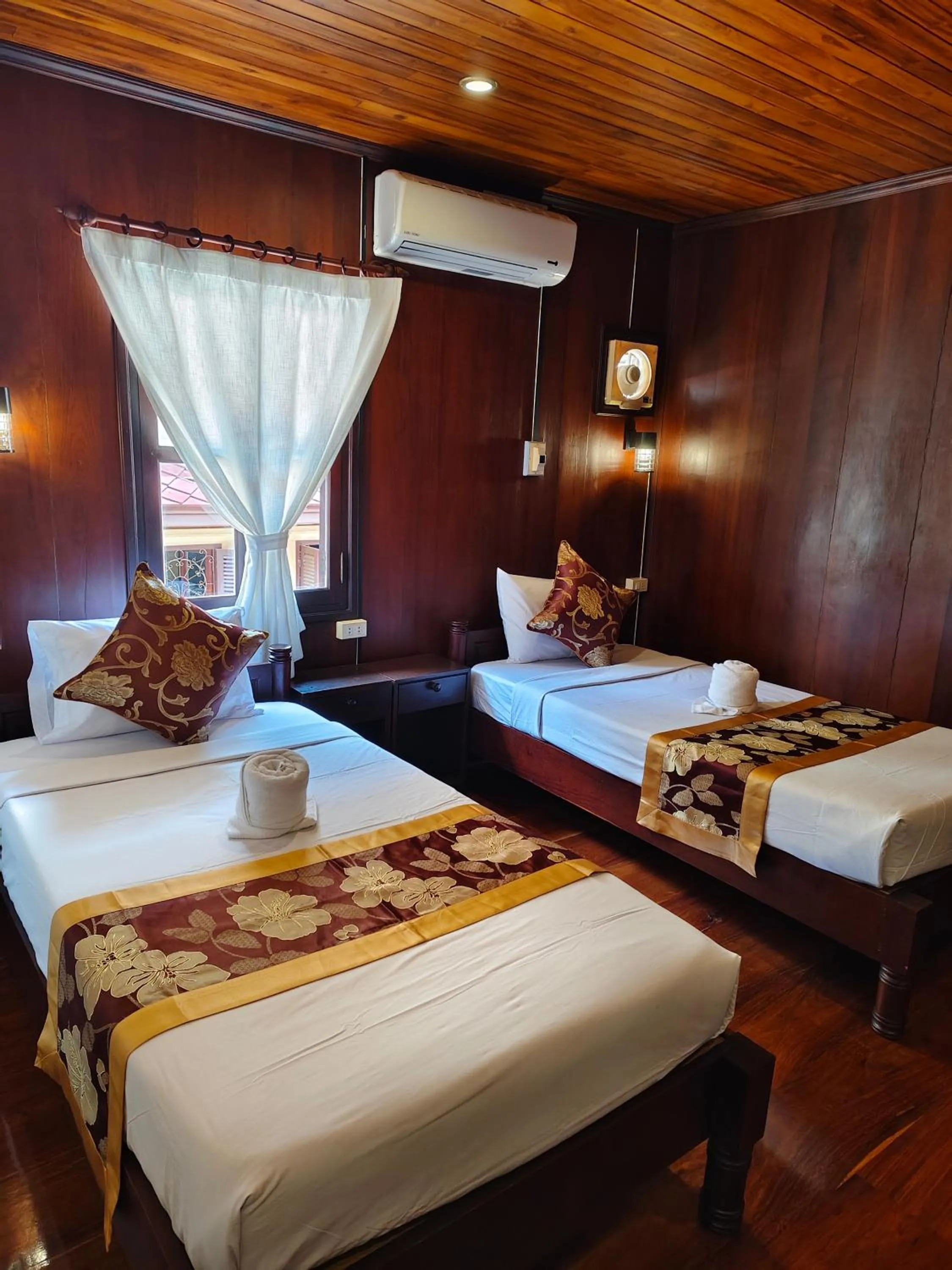 Bed in Bouakham Chanthasack Guesthouse