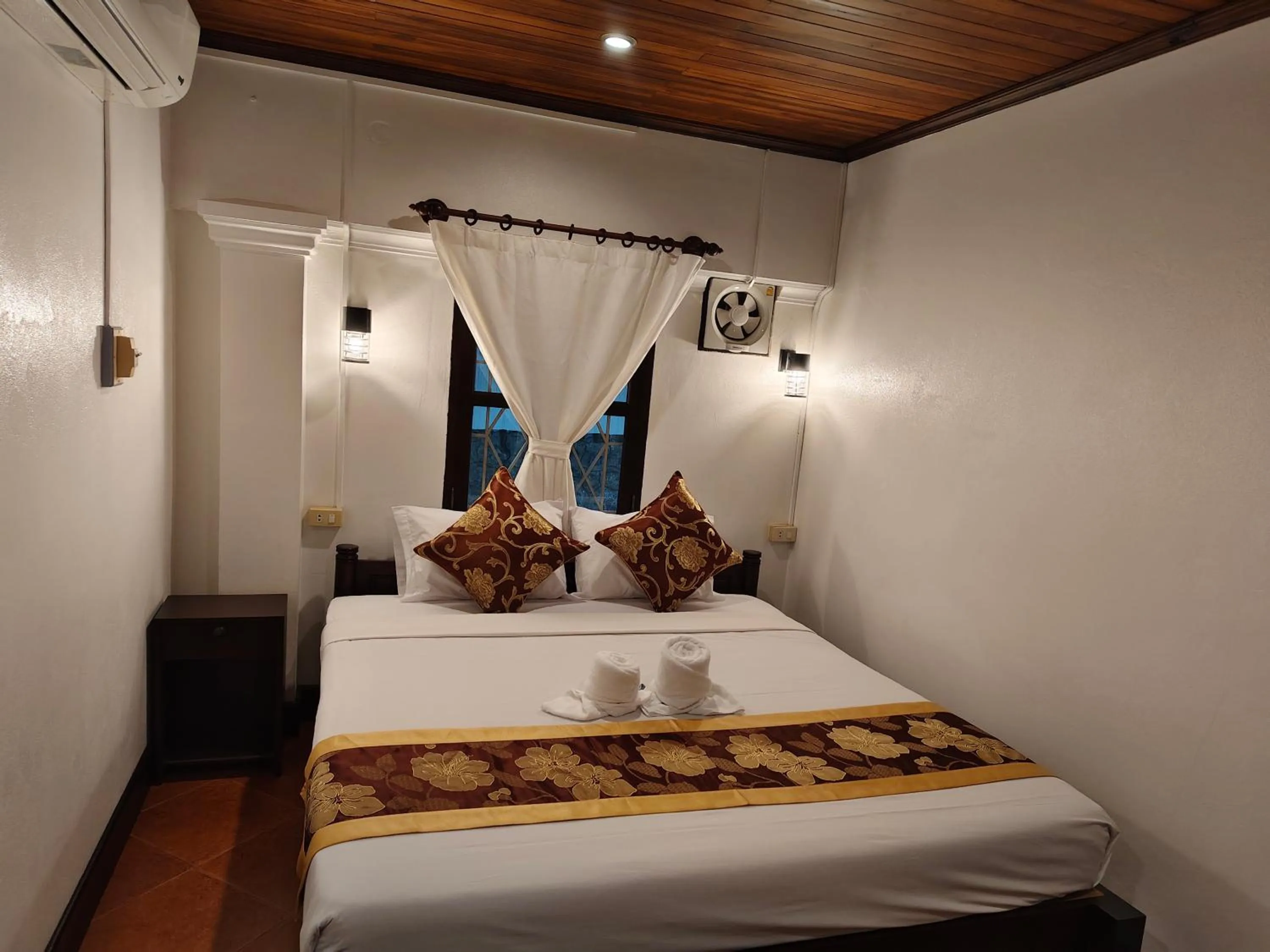 Bed in Bouakham Chanthasack Guesthouse