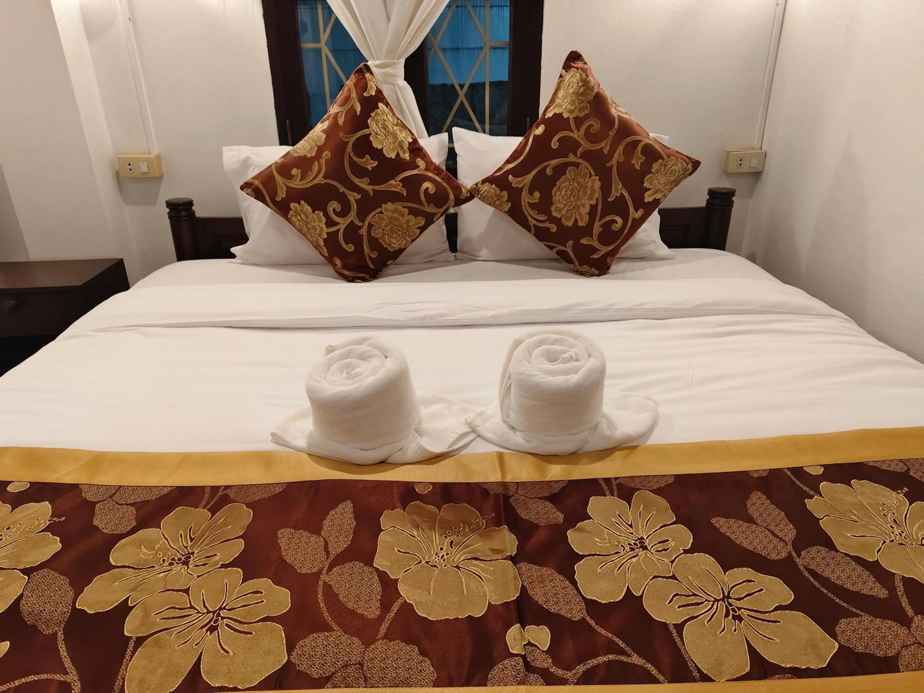 Bed in Bouakham Chanthasack Guesthouse