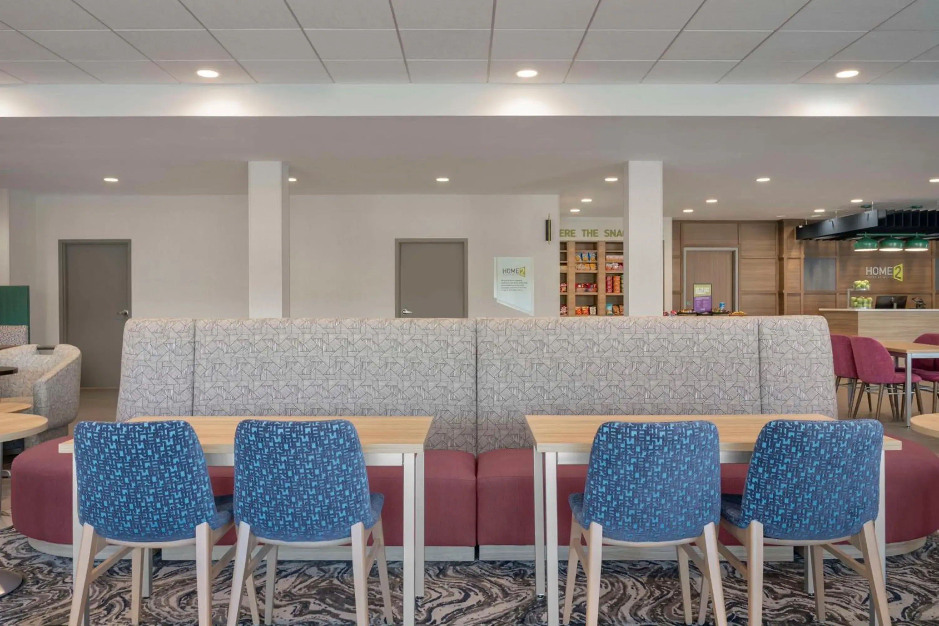 Lobby or reception in Home2 Suites By Hilton Sanford Orlando North Lobby or reception in Home2 Suites By Hilton Sanford Orlando North