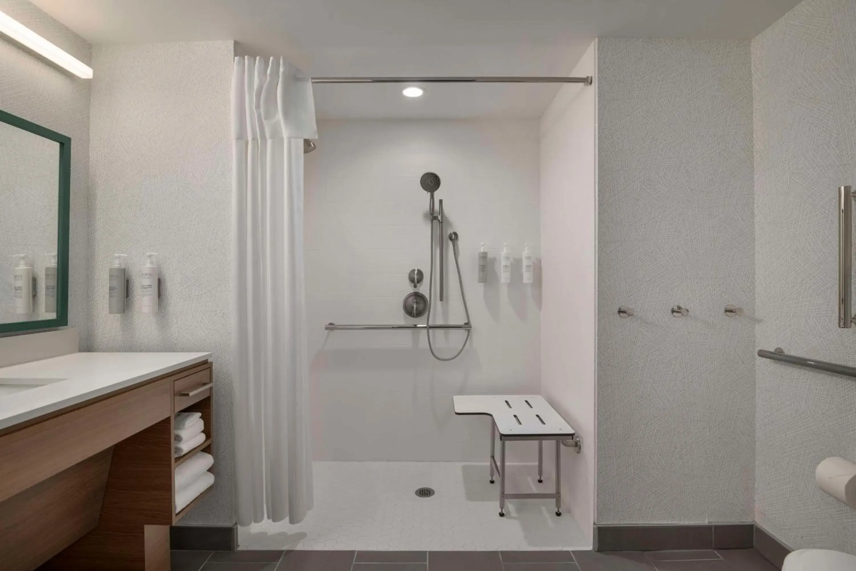 Living room in Home2 Suites By Hilton Sanford Orlando North Living room in Home2 Suites By Hilton Sanford Orlando North