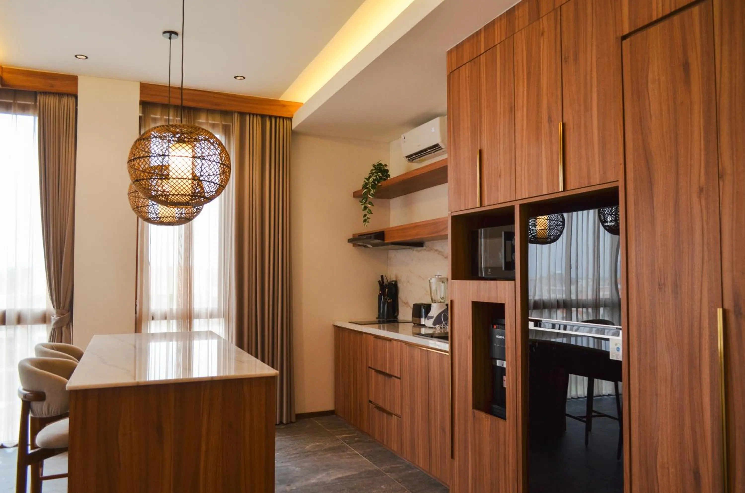 Kitchen or kitchenette in KammOra Living and Villas