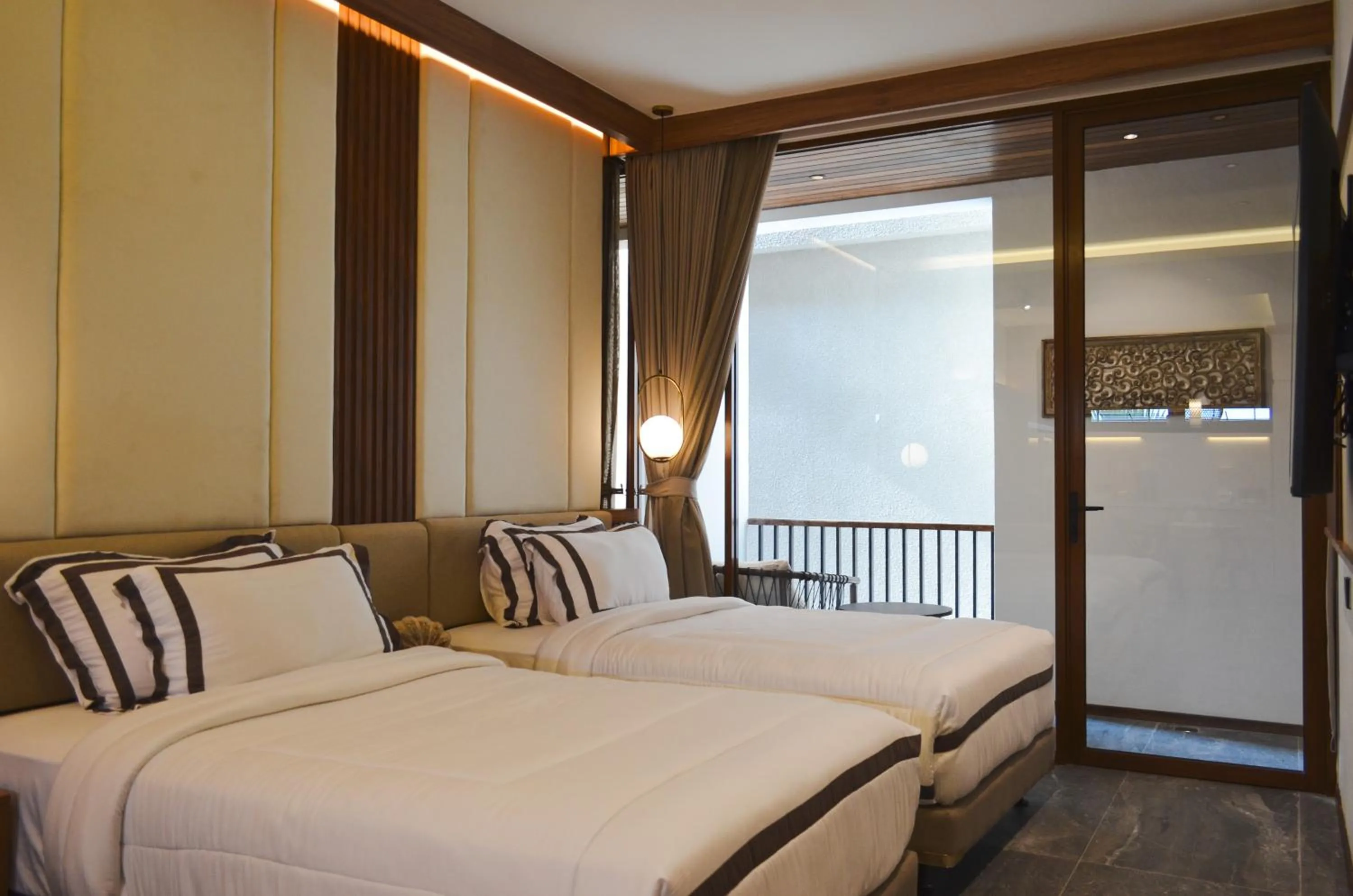 Bed in KammOra Living and Villas