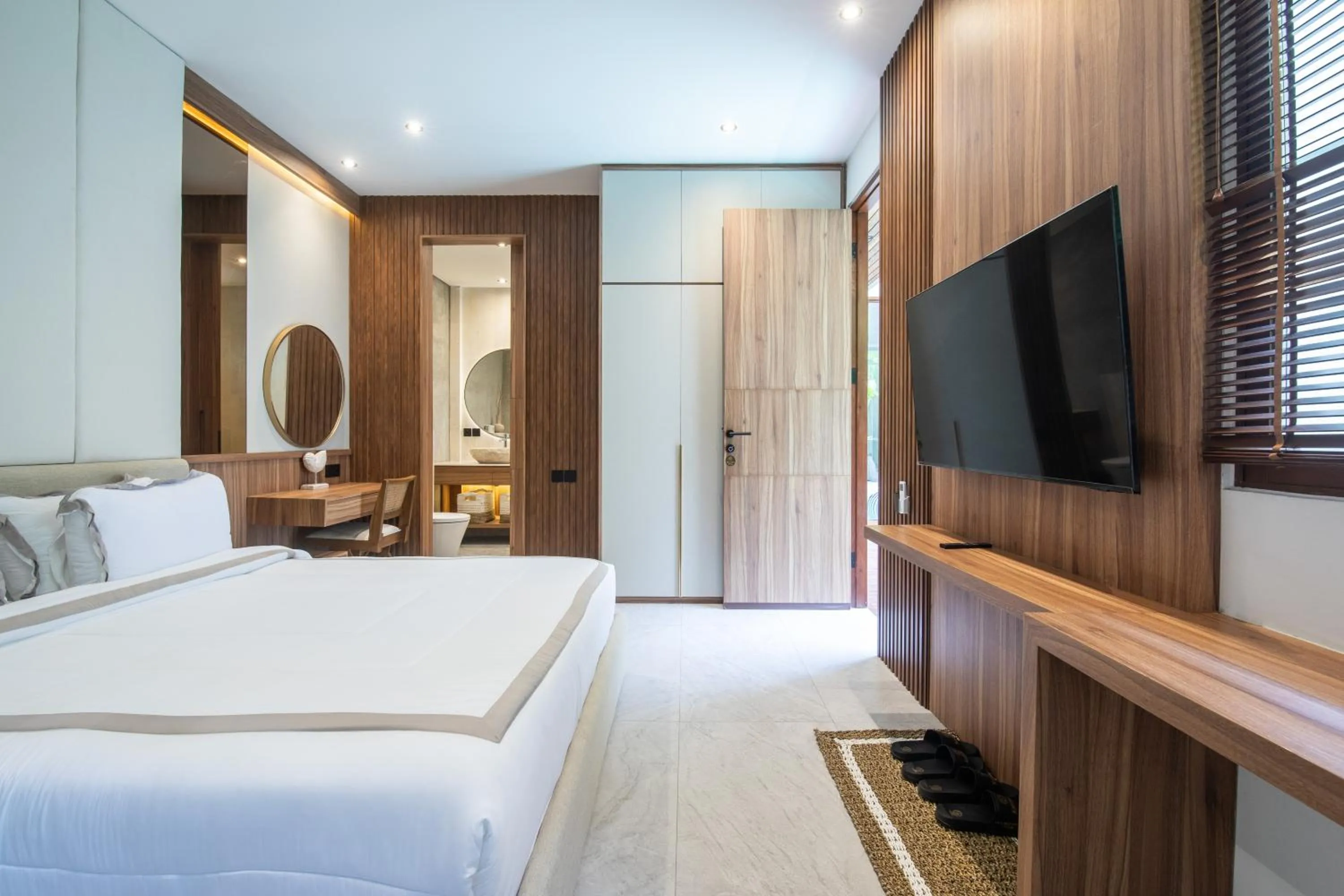 Bed in KammOra Living and Villas