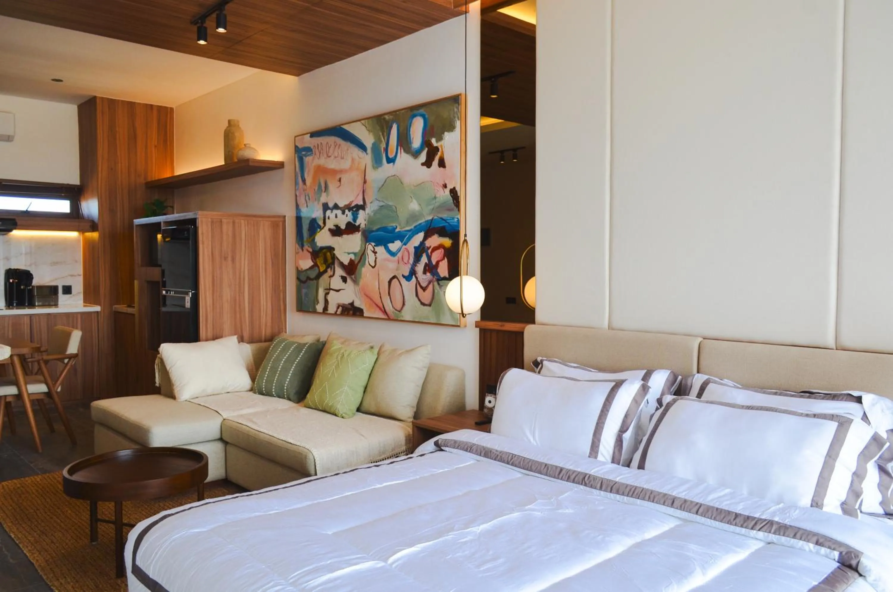 Bed in KammOra Living and Villas