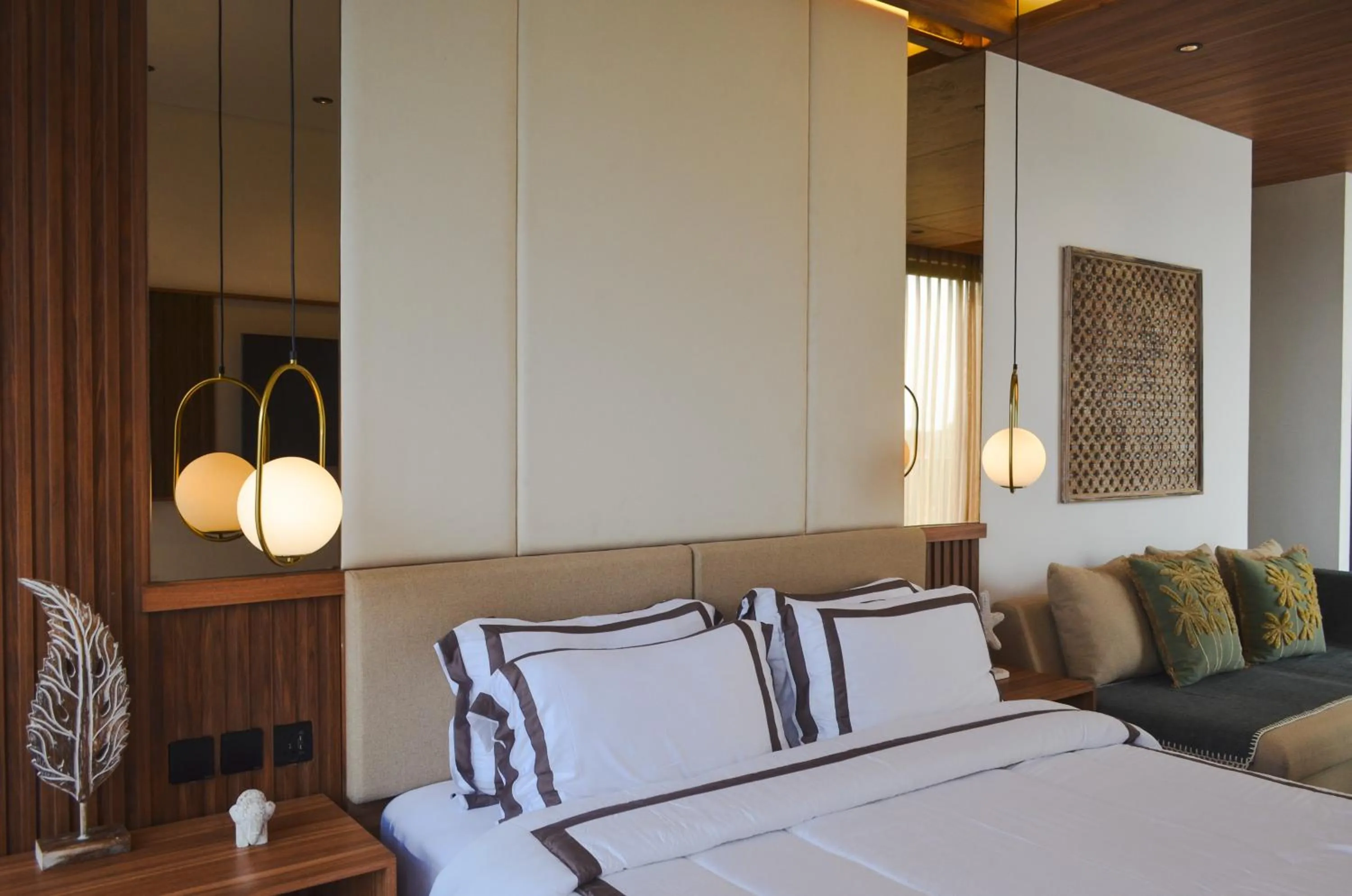 Bed in KammOra Living and Villas