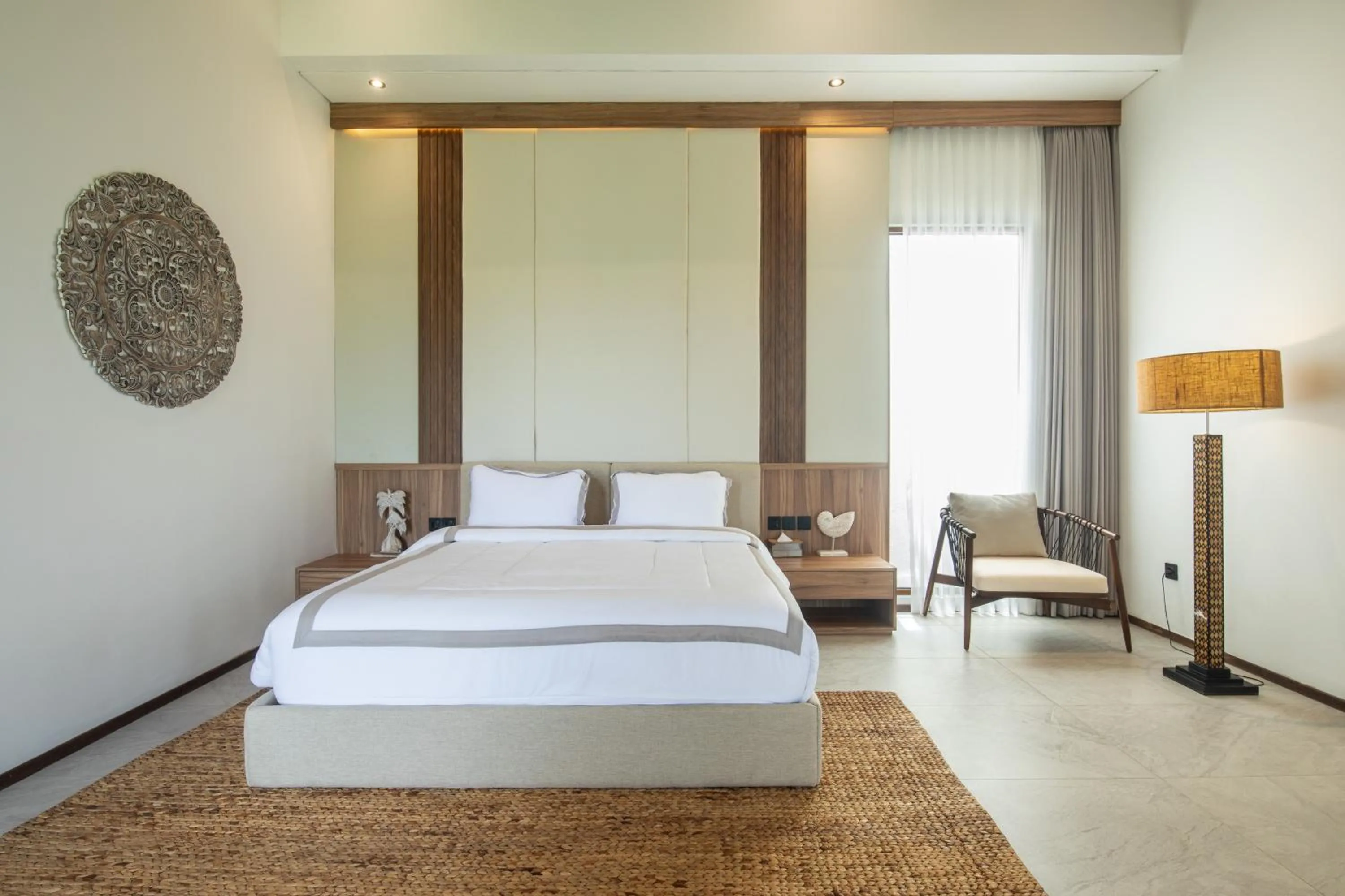 Bed in KammOra Living and Villas