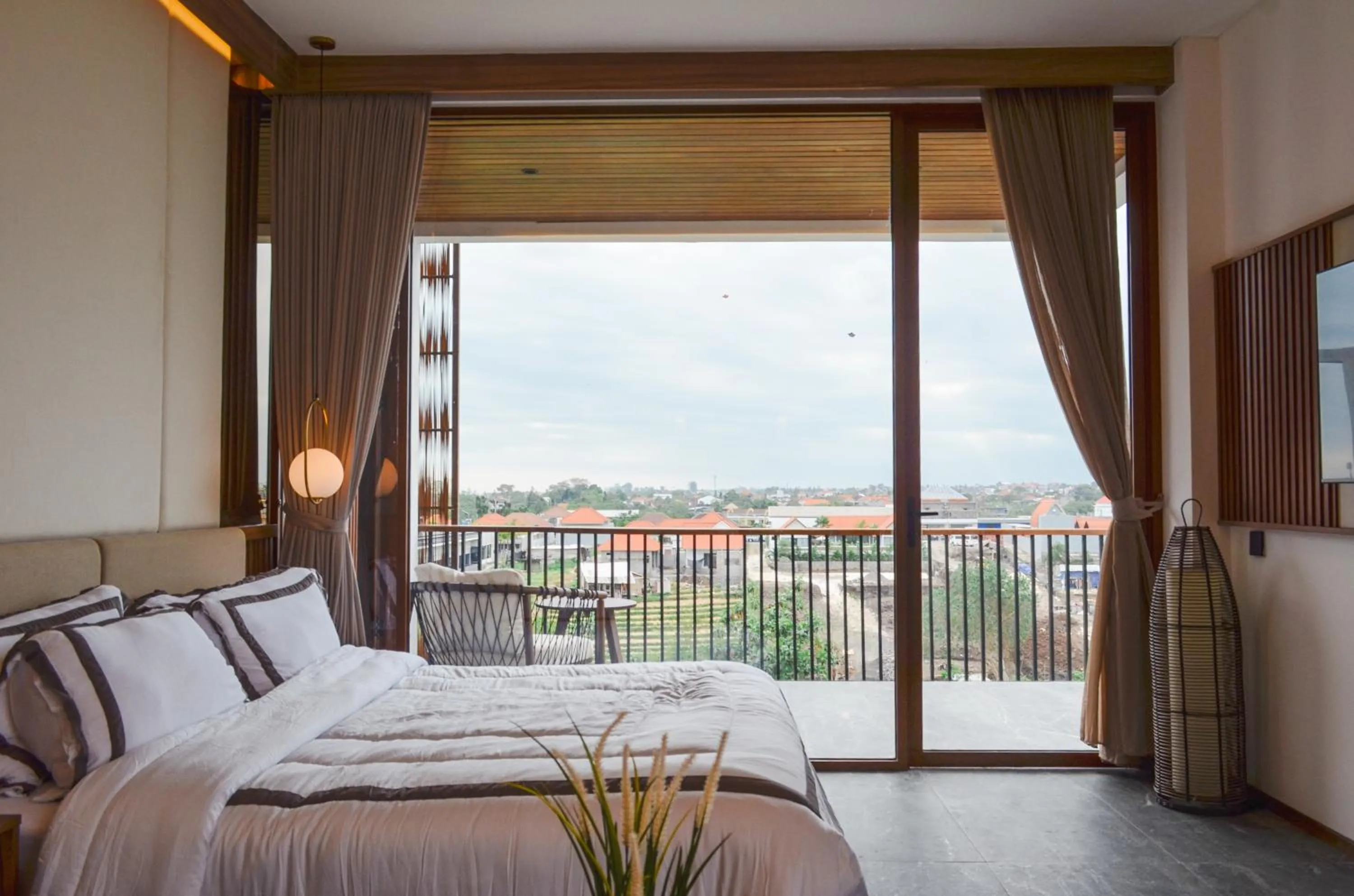 Bed in KammOra Living and Villas