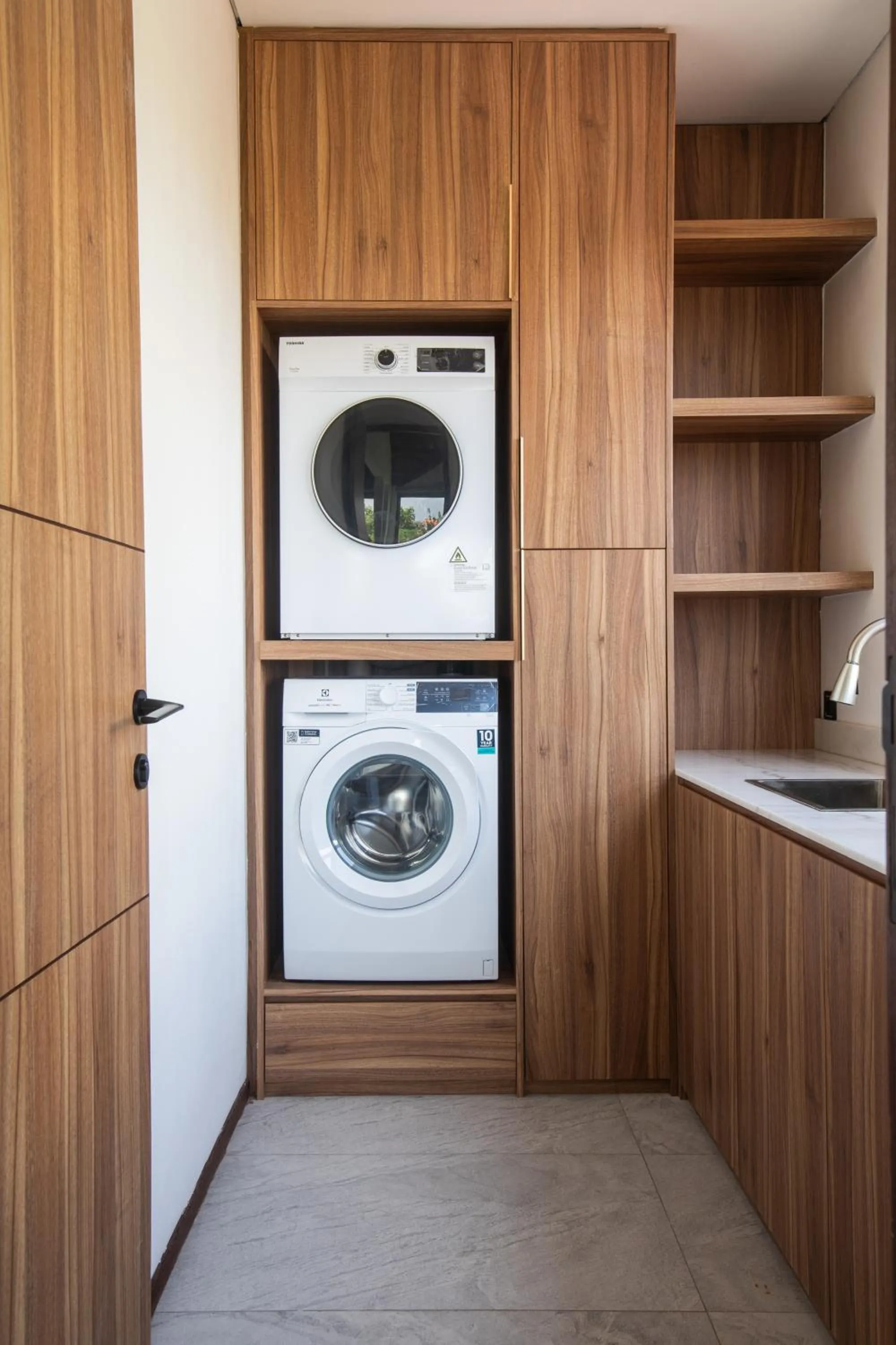 washing machine in KammOra Living and Villas
