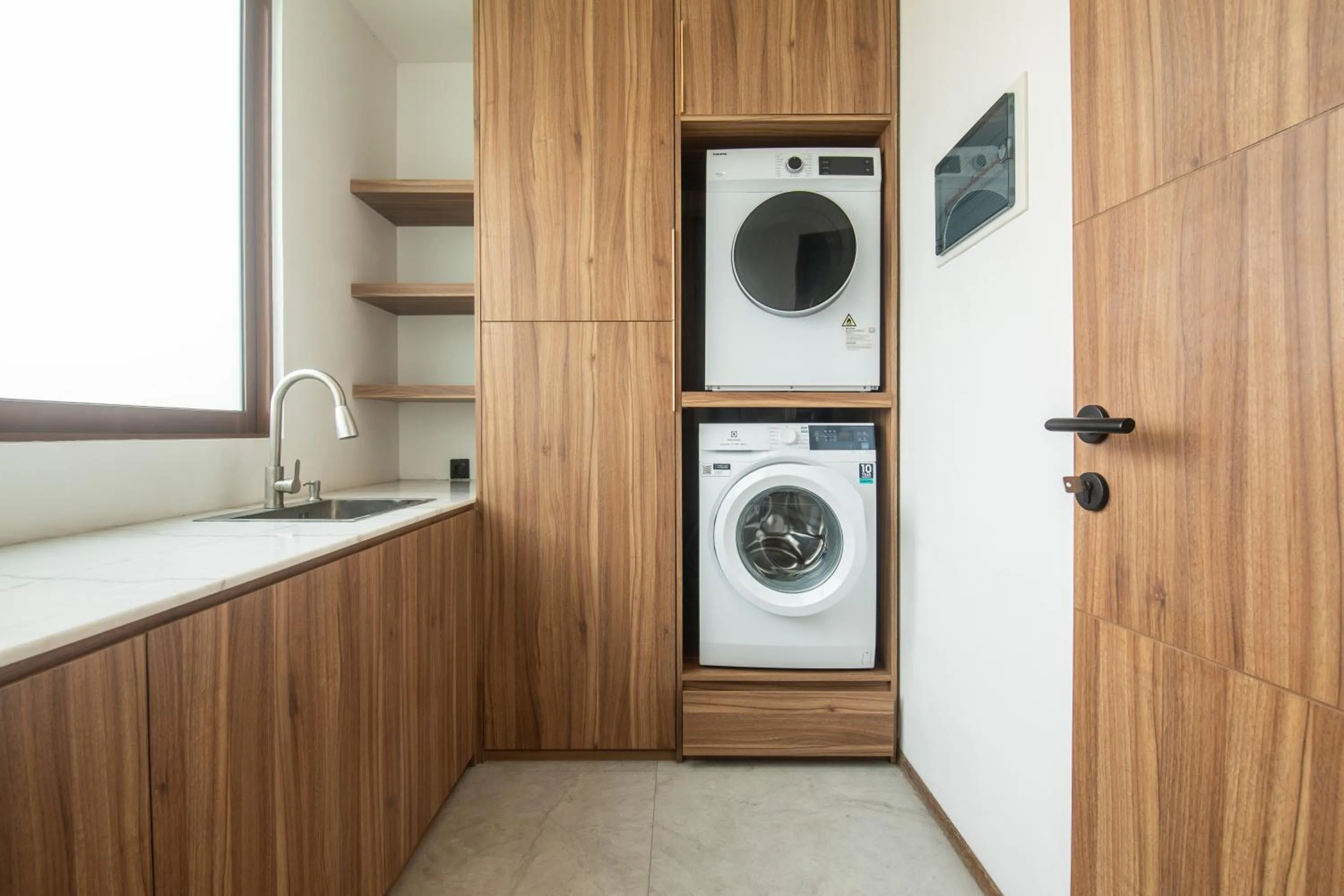washing machine in KammOra Living and Villas