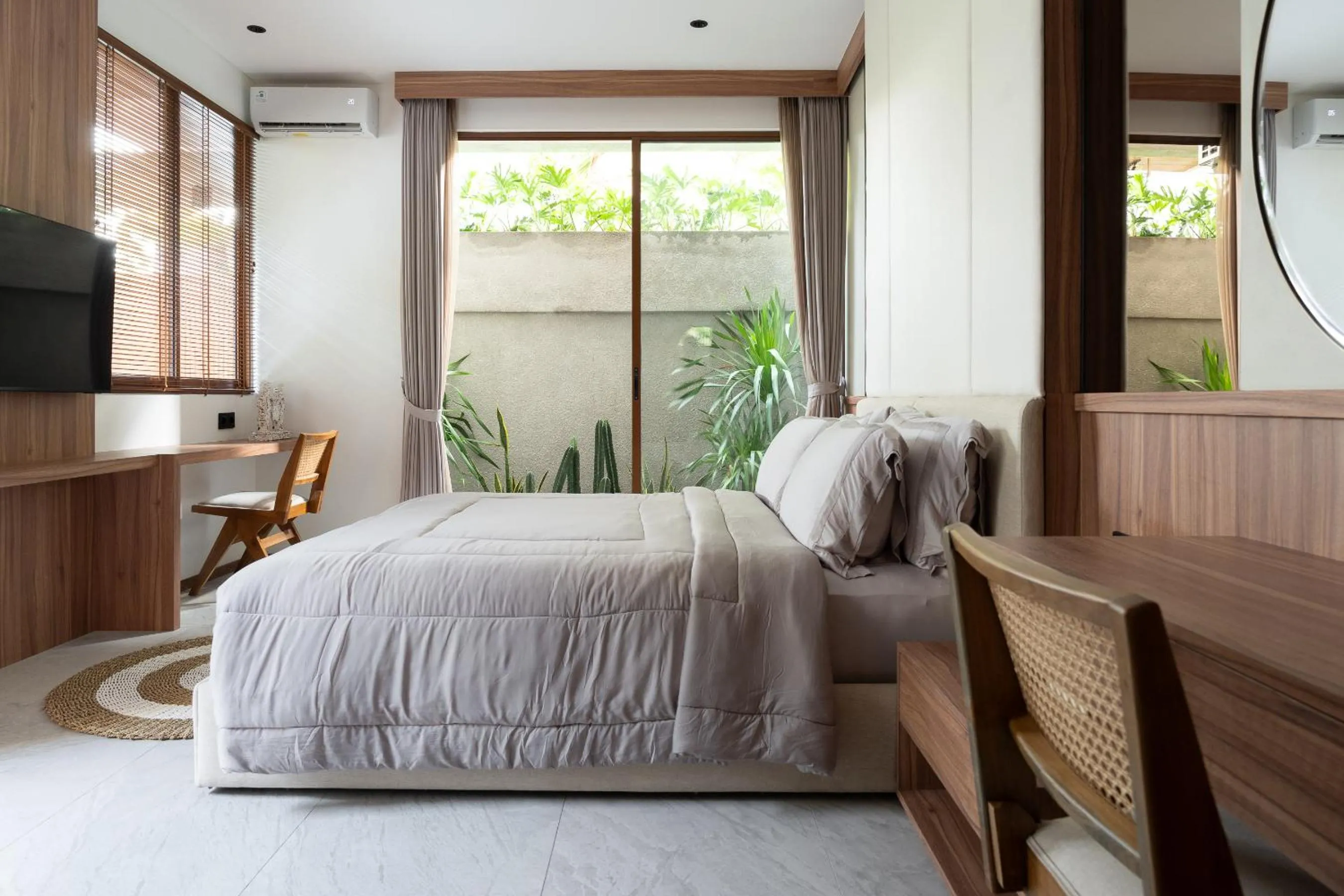 Bed in KammOra Living and Villas