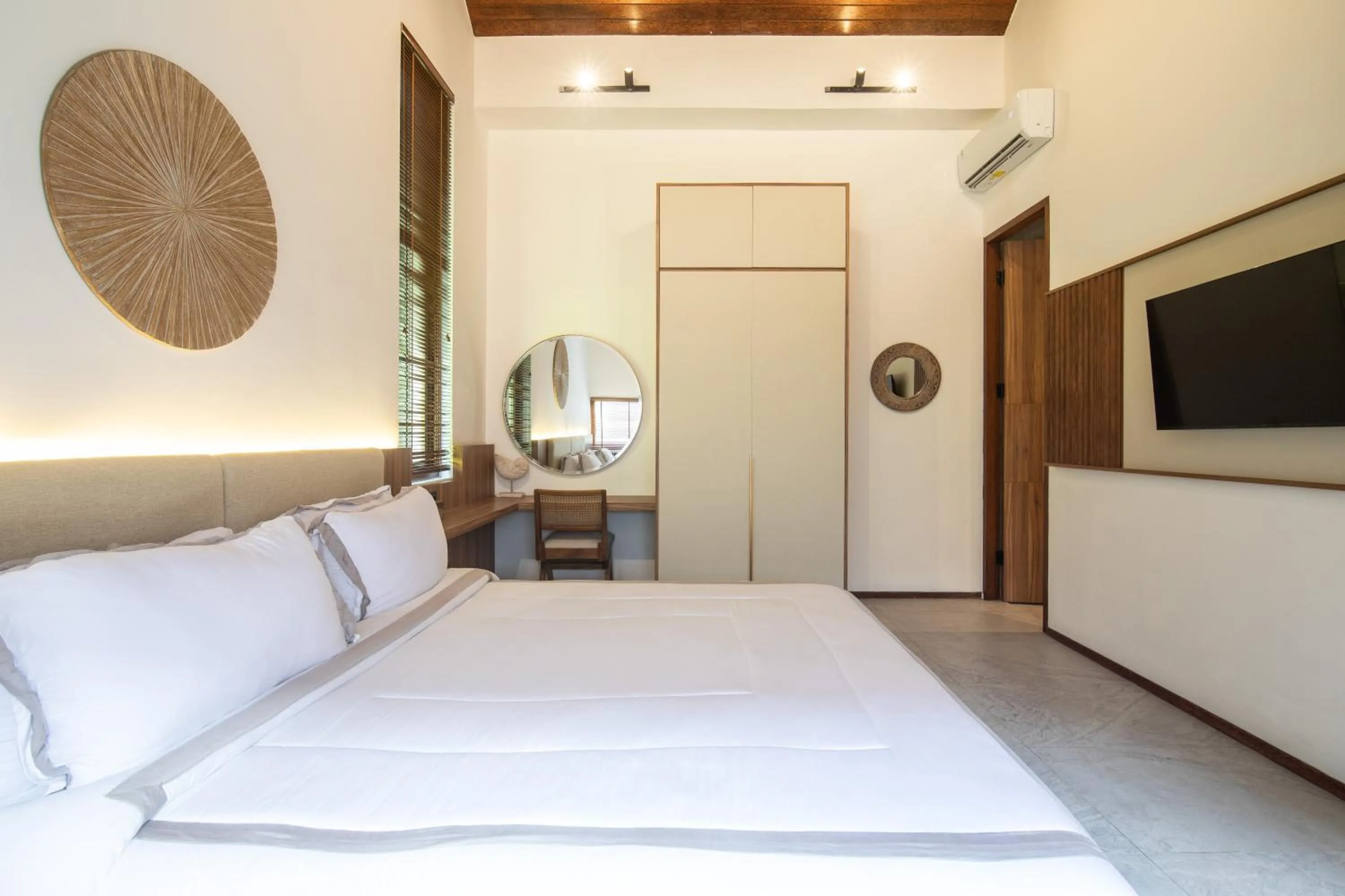 Bed in KammOra Living and Villas