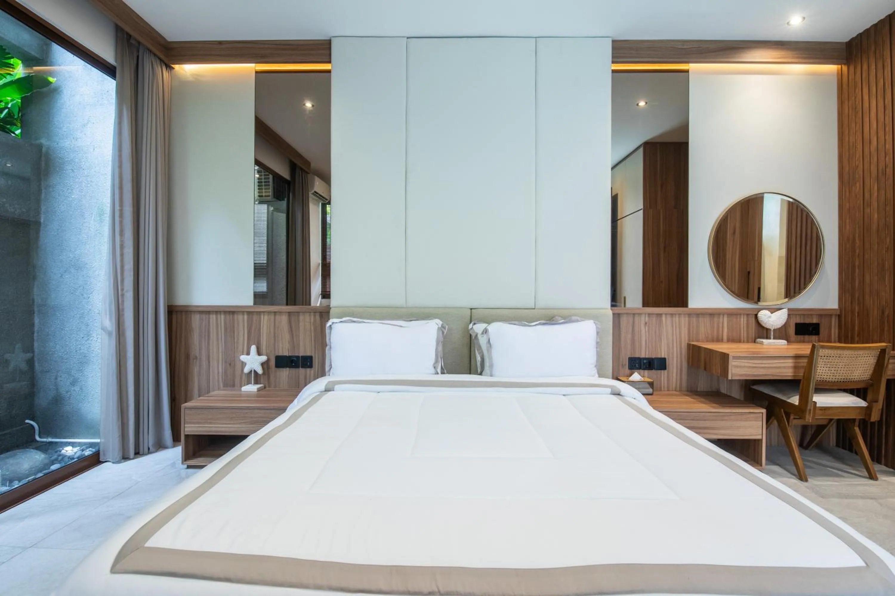 Bed in KammOra Living and Villas
