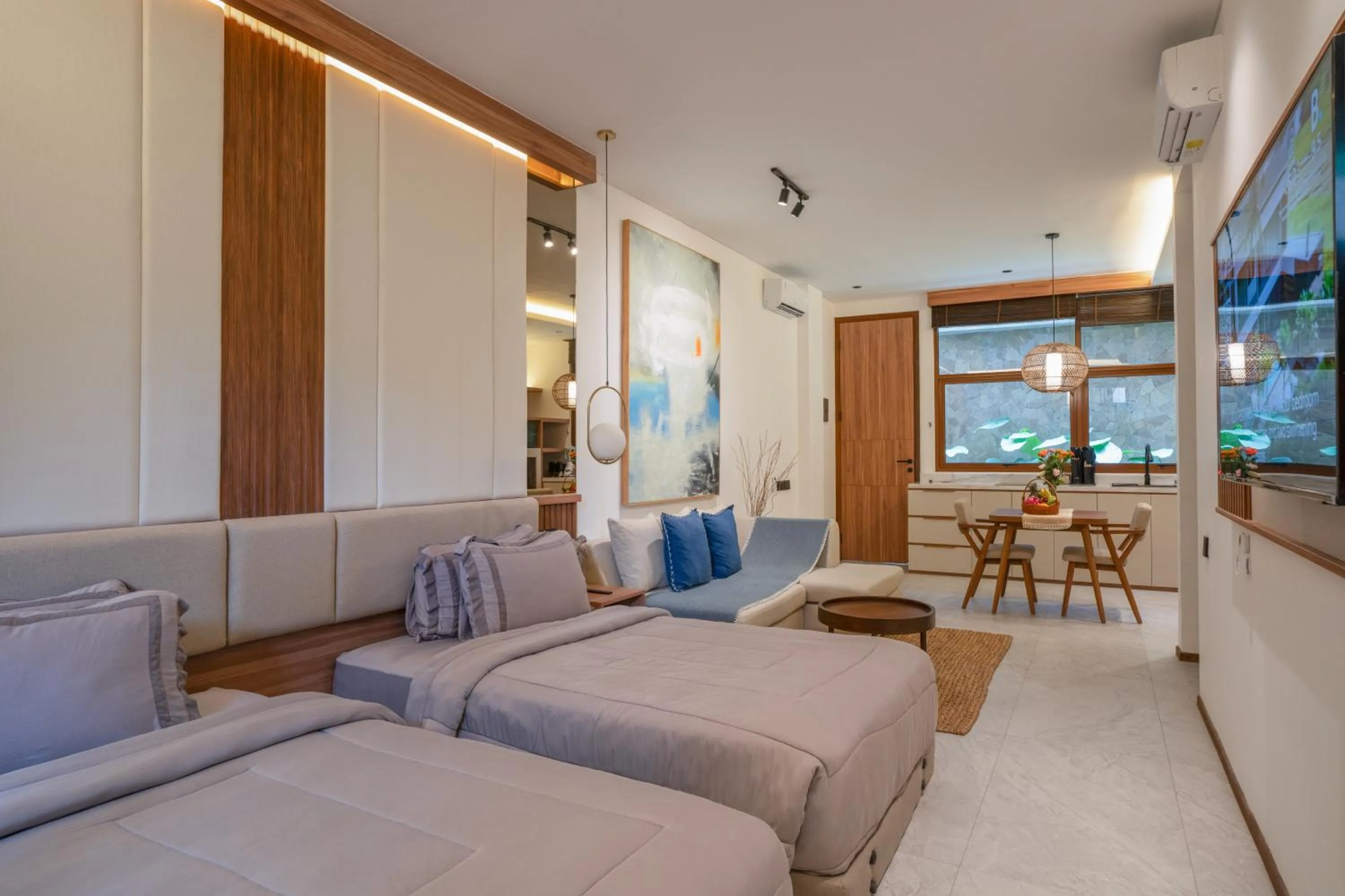 Bed in KammOra Living and Villas