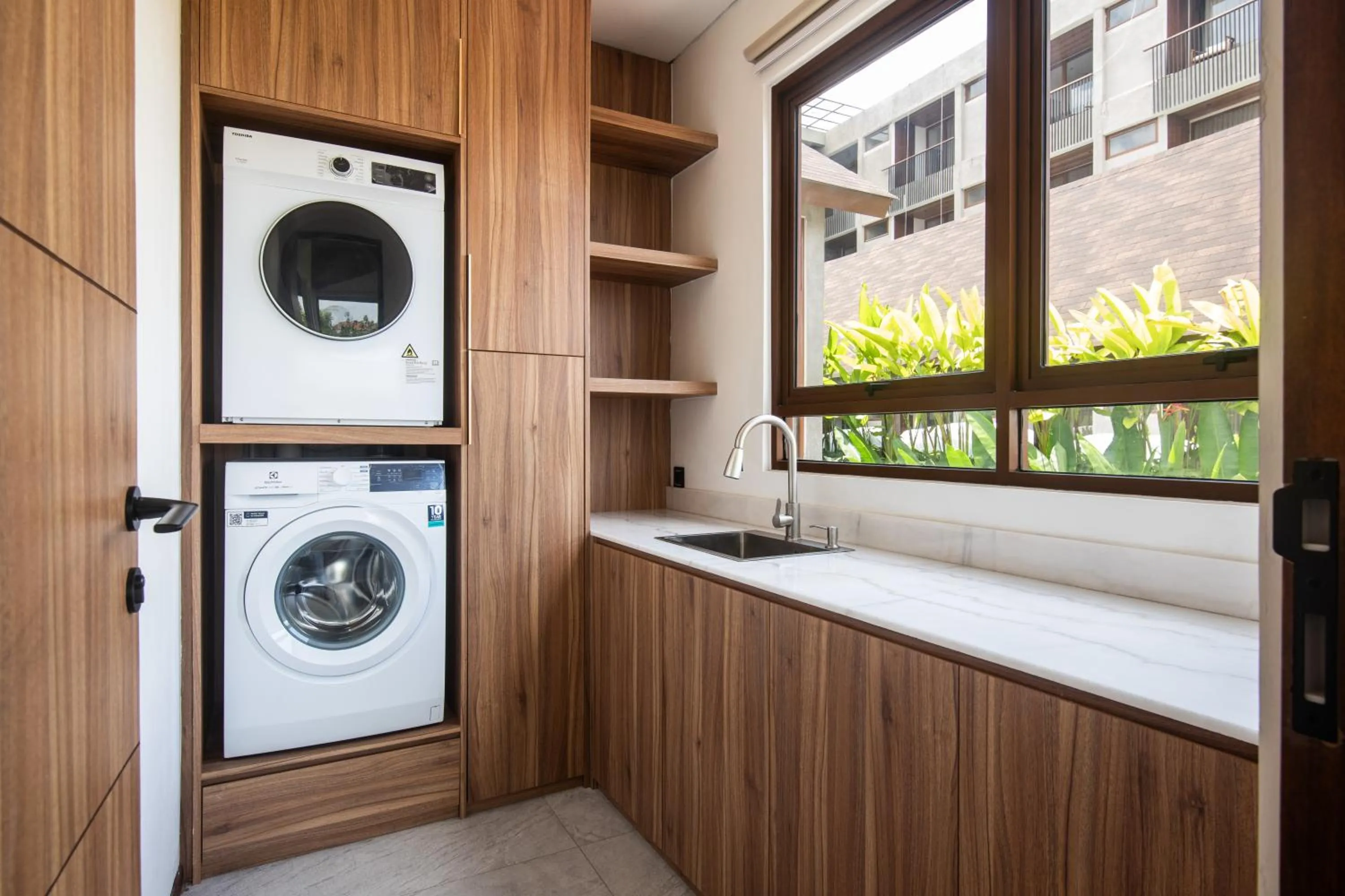 washing machine in KammOra Living and Villas