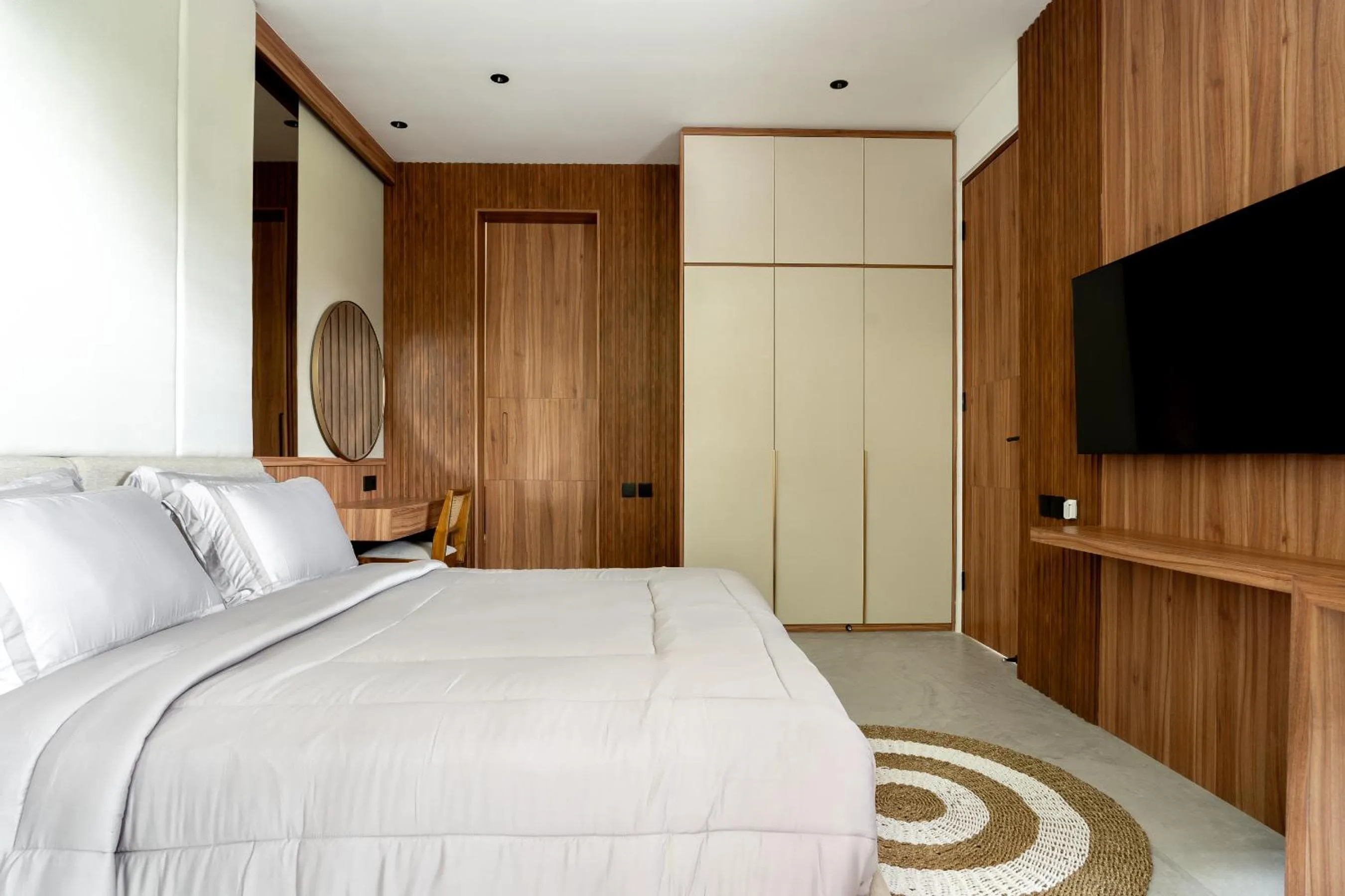 Bed in KammOra Living and Villas