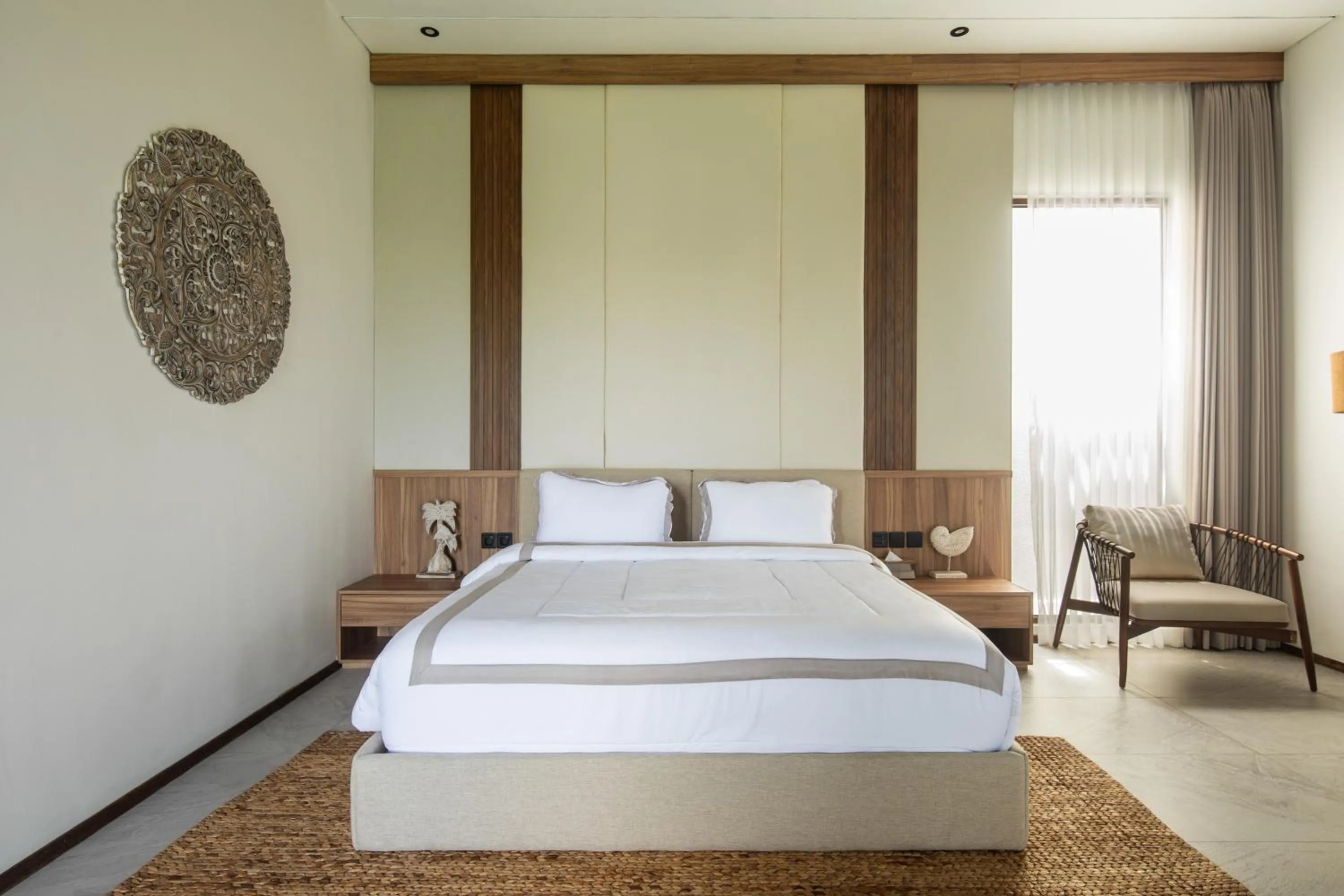 Bed in KammOra Living and Villas
