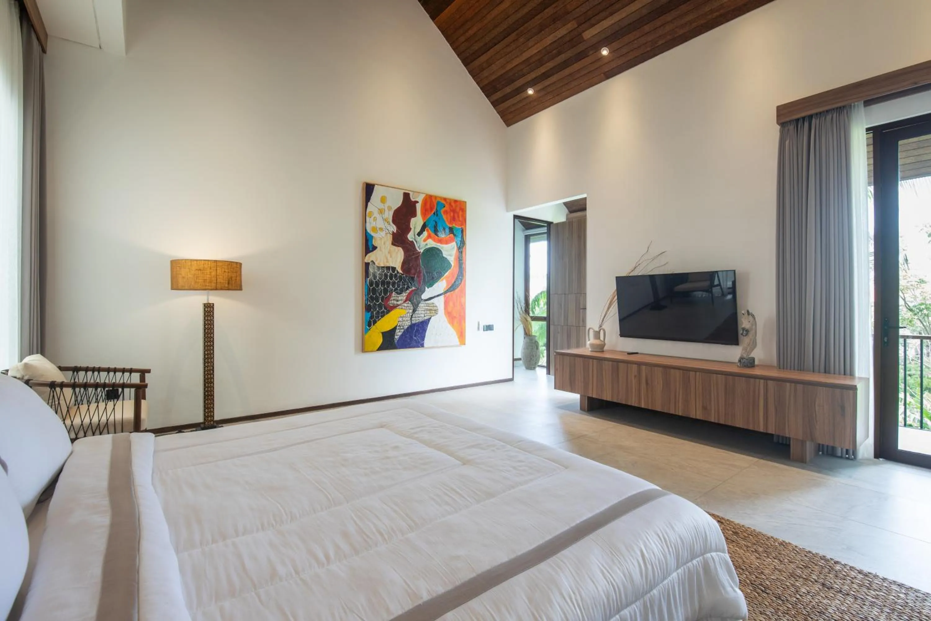 Bed in KammOra Living and Villas