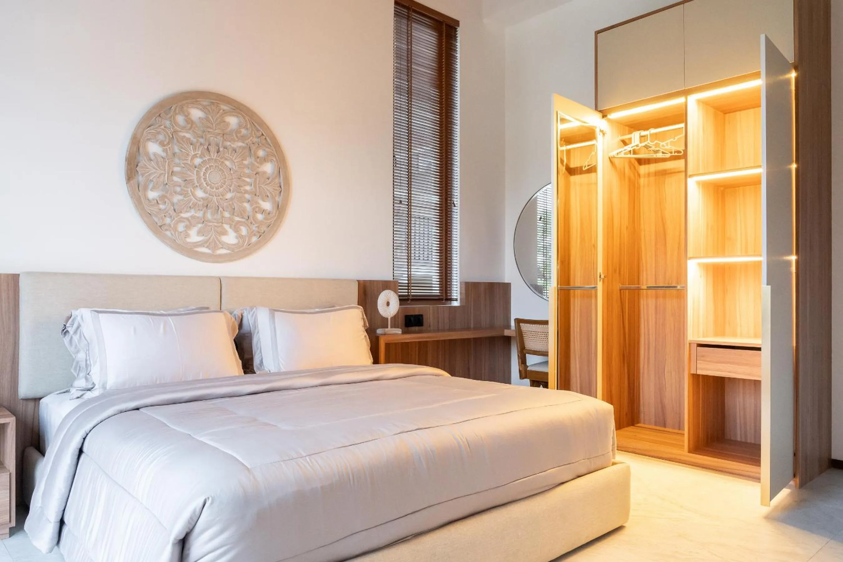 Bed in KammOra Living and Villas