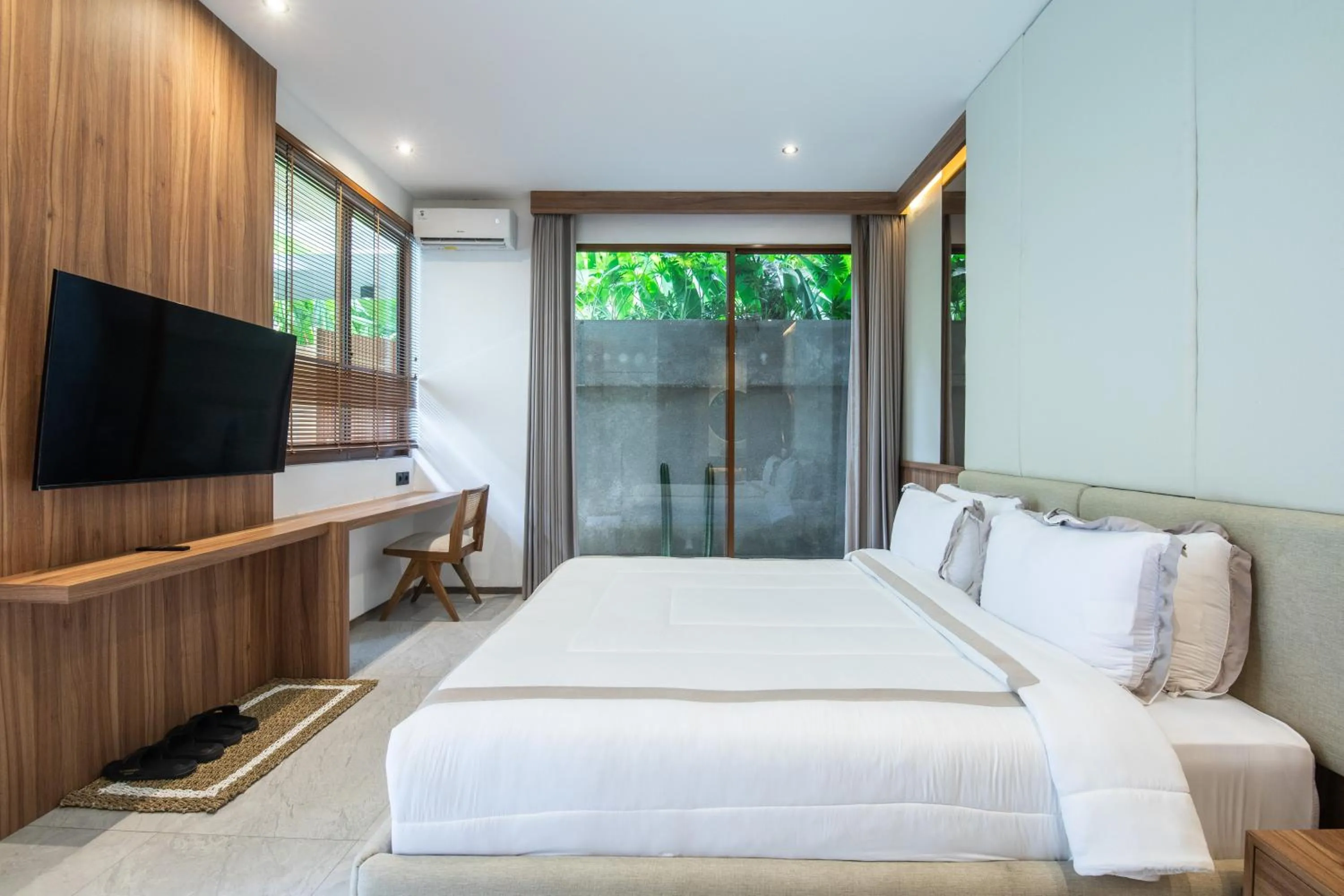 Bed in KammOra Living and Villas