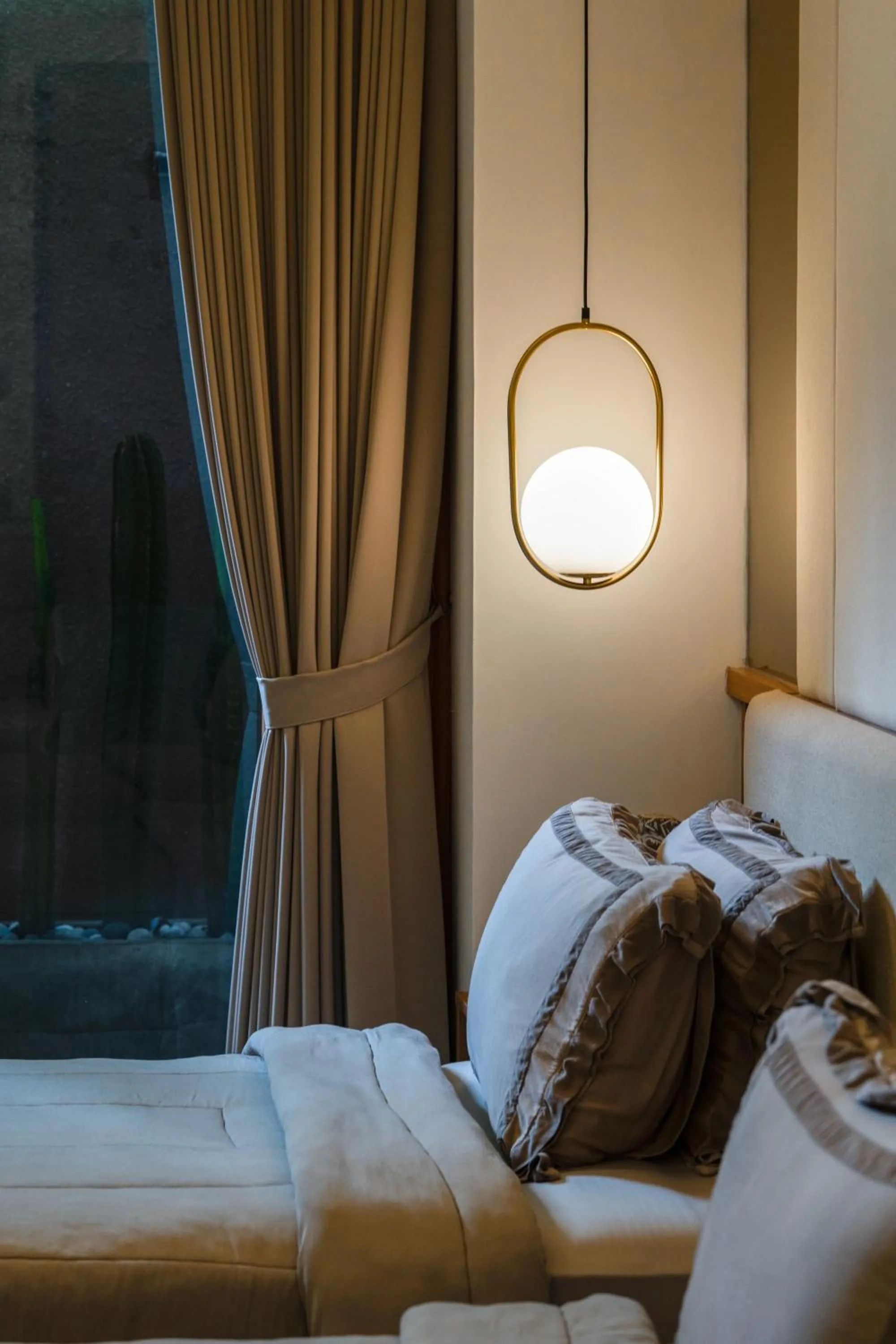Bed in KammOra Living and Villas