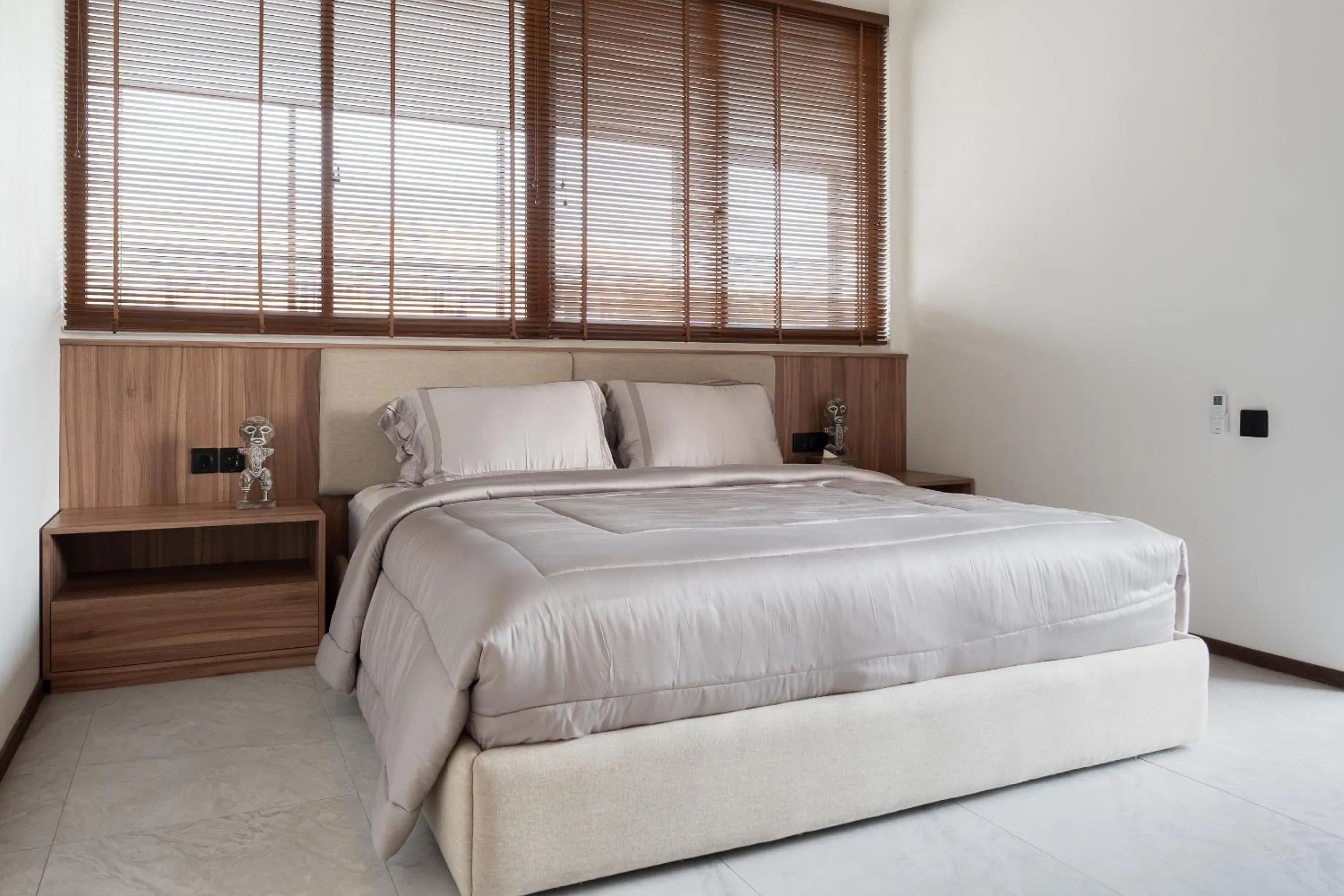 Bed in KammOra Living and Villas