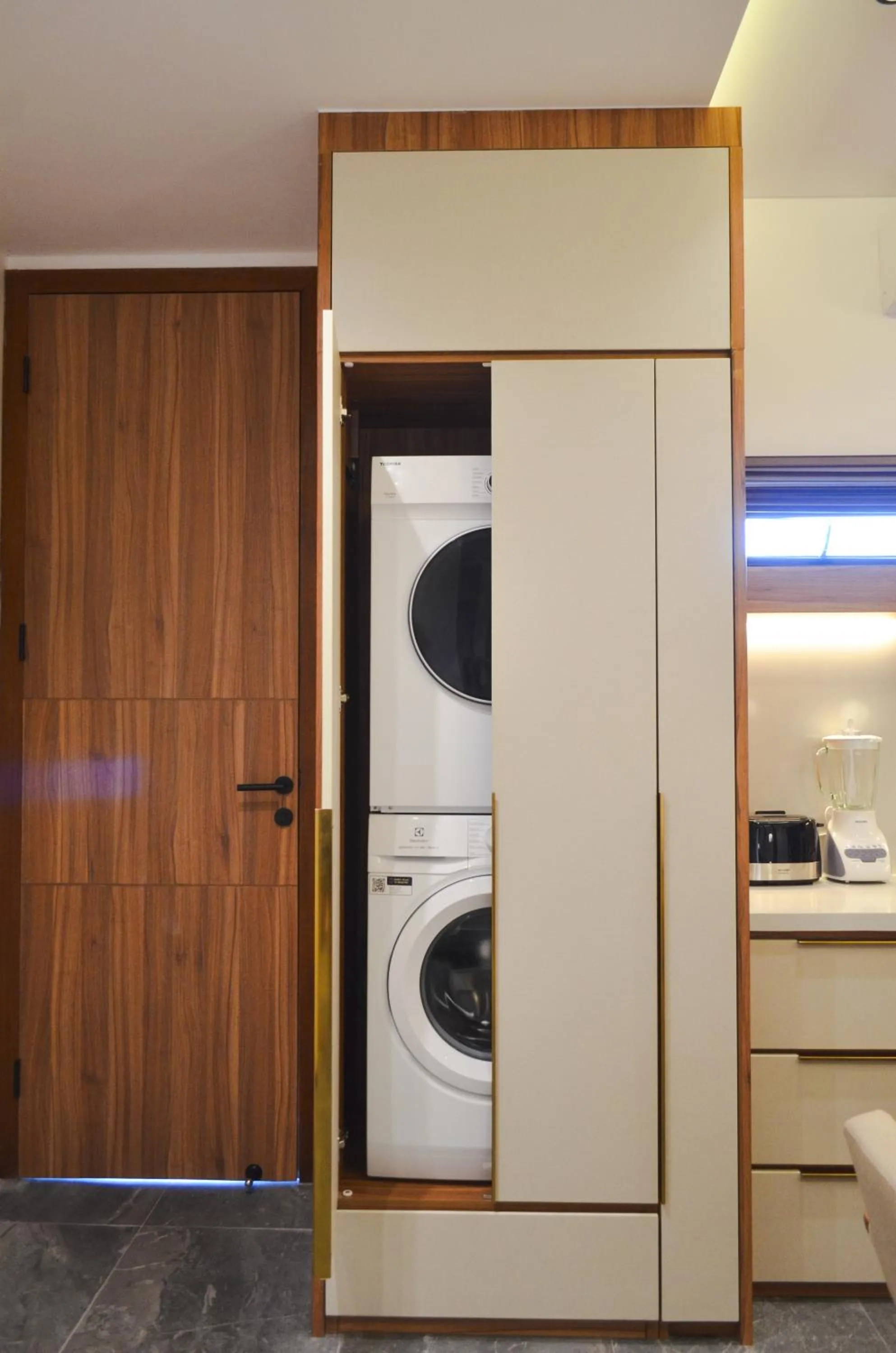 washing machine in KammOra Living and Villas