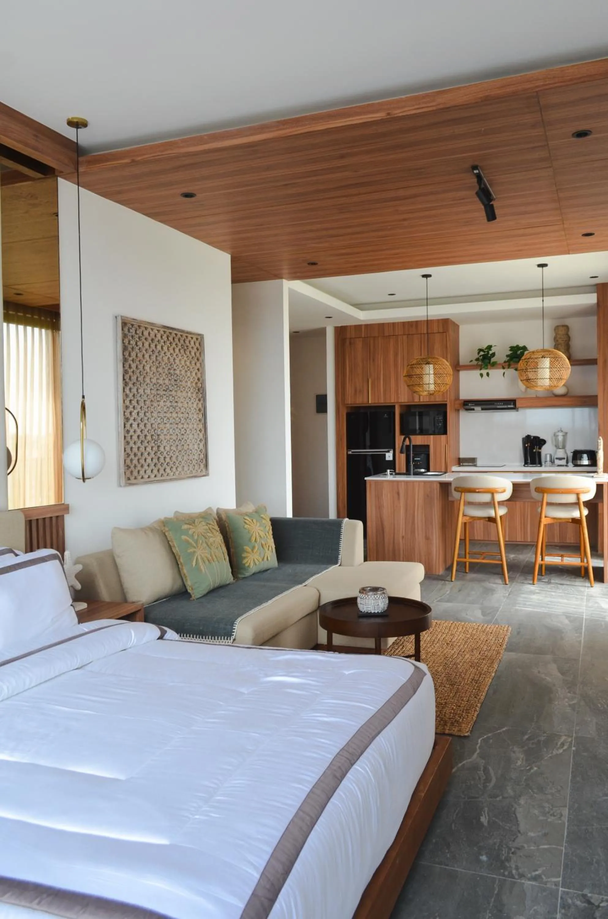 Bed in KammOra Living and Villas