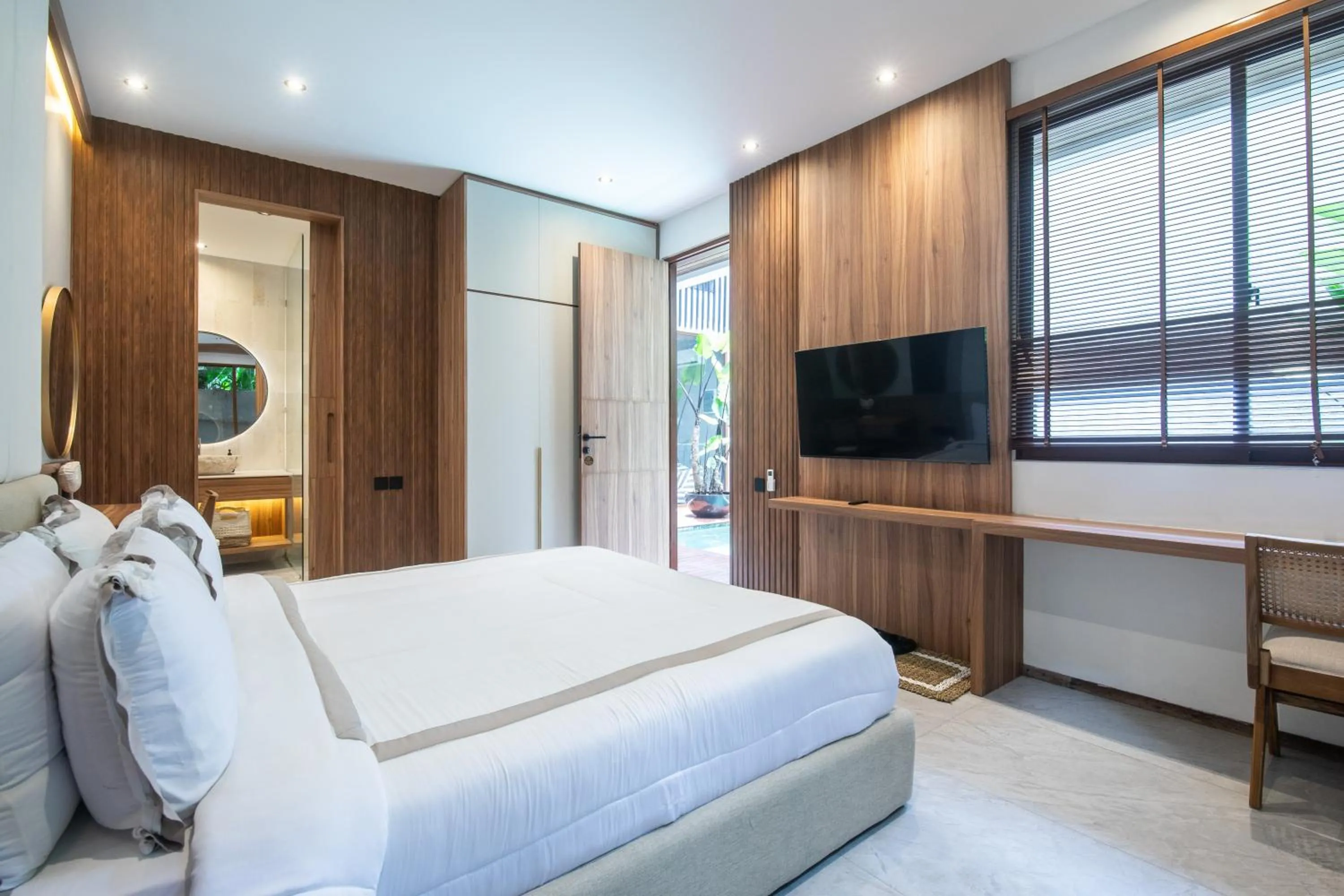 Bed in KammOra Living and Villas