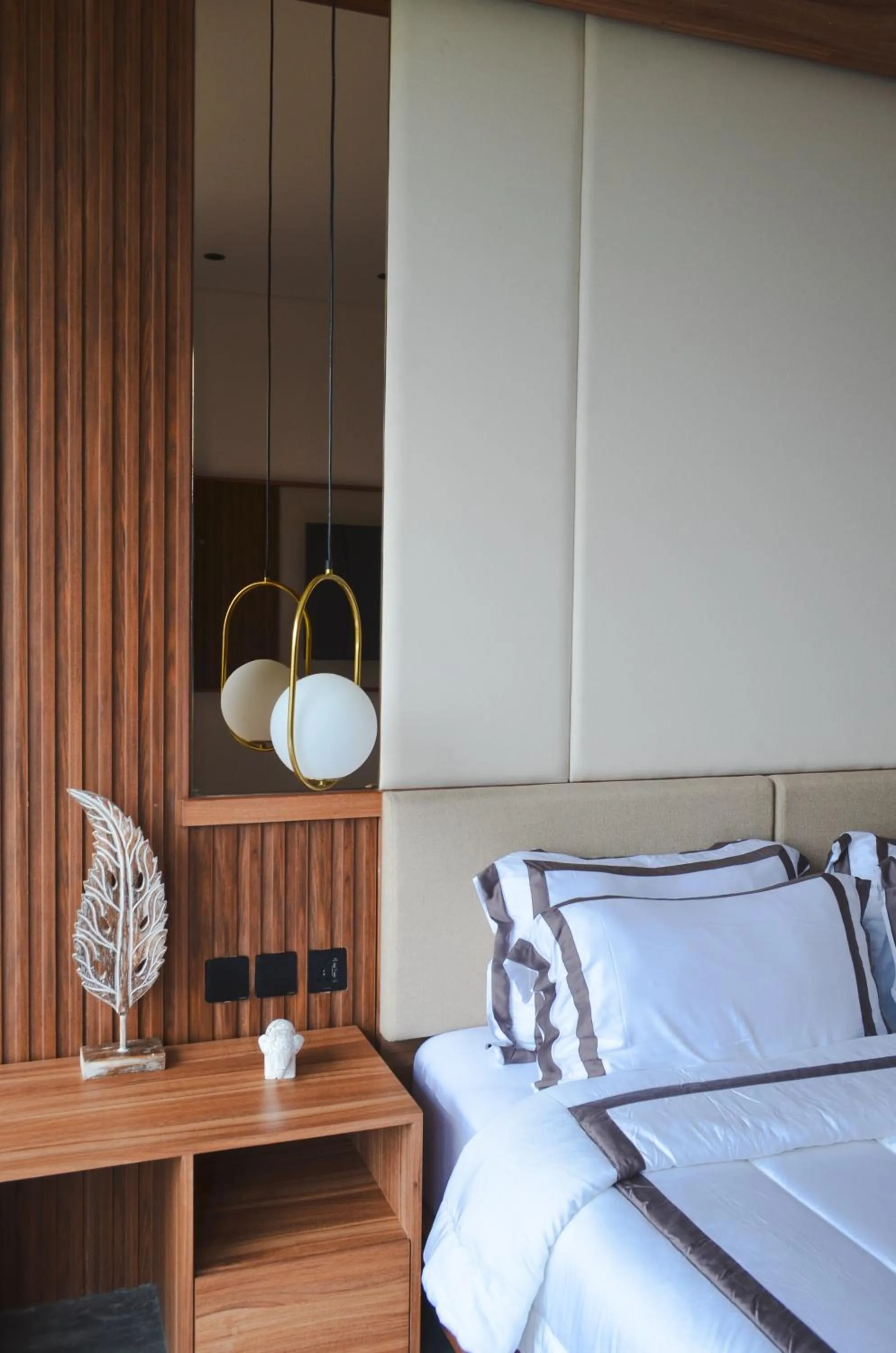 Bed in KammOra Living and Villas