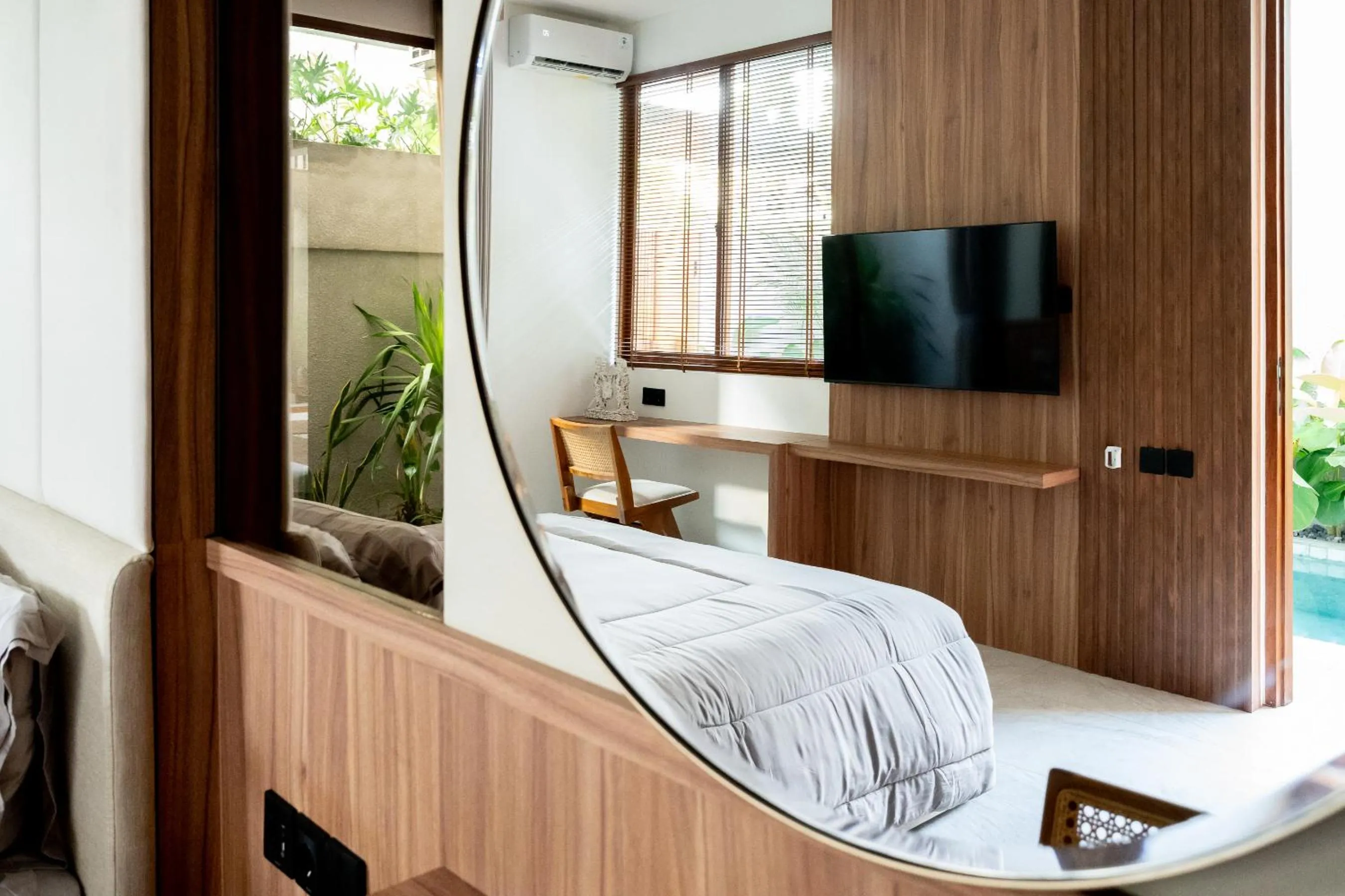 Bed in KammOra Living and Villas