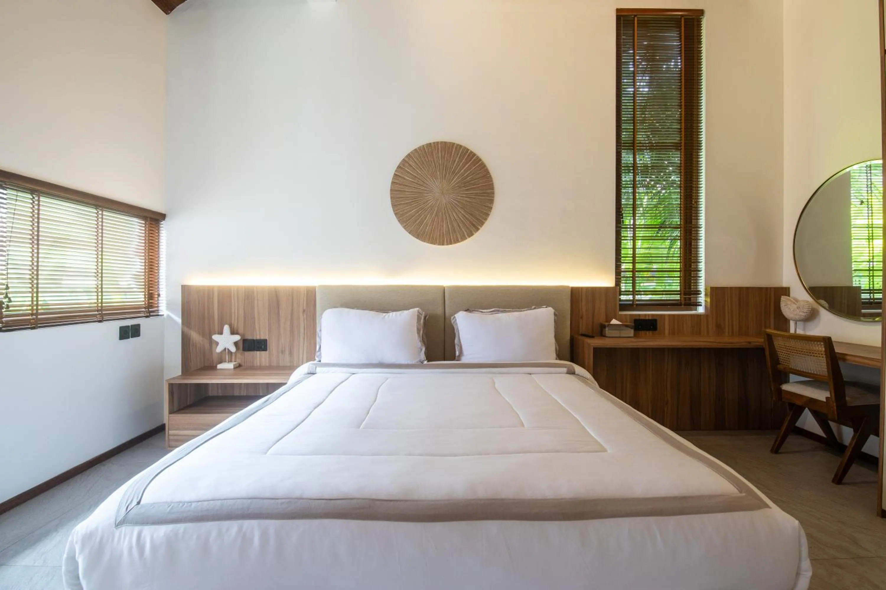 Bed in KammOra Living and Villas