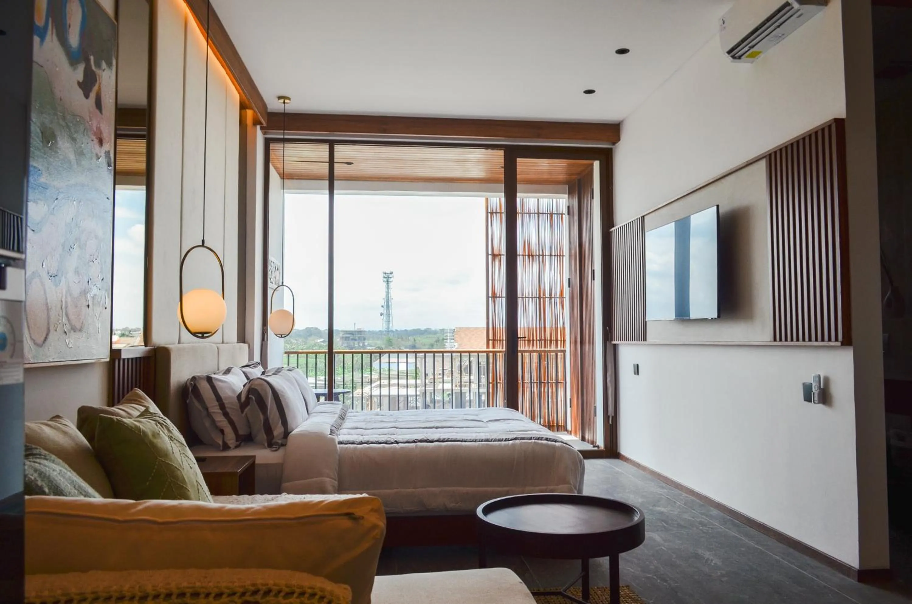 Bed in KammOra Living and Villas