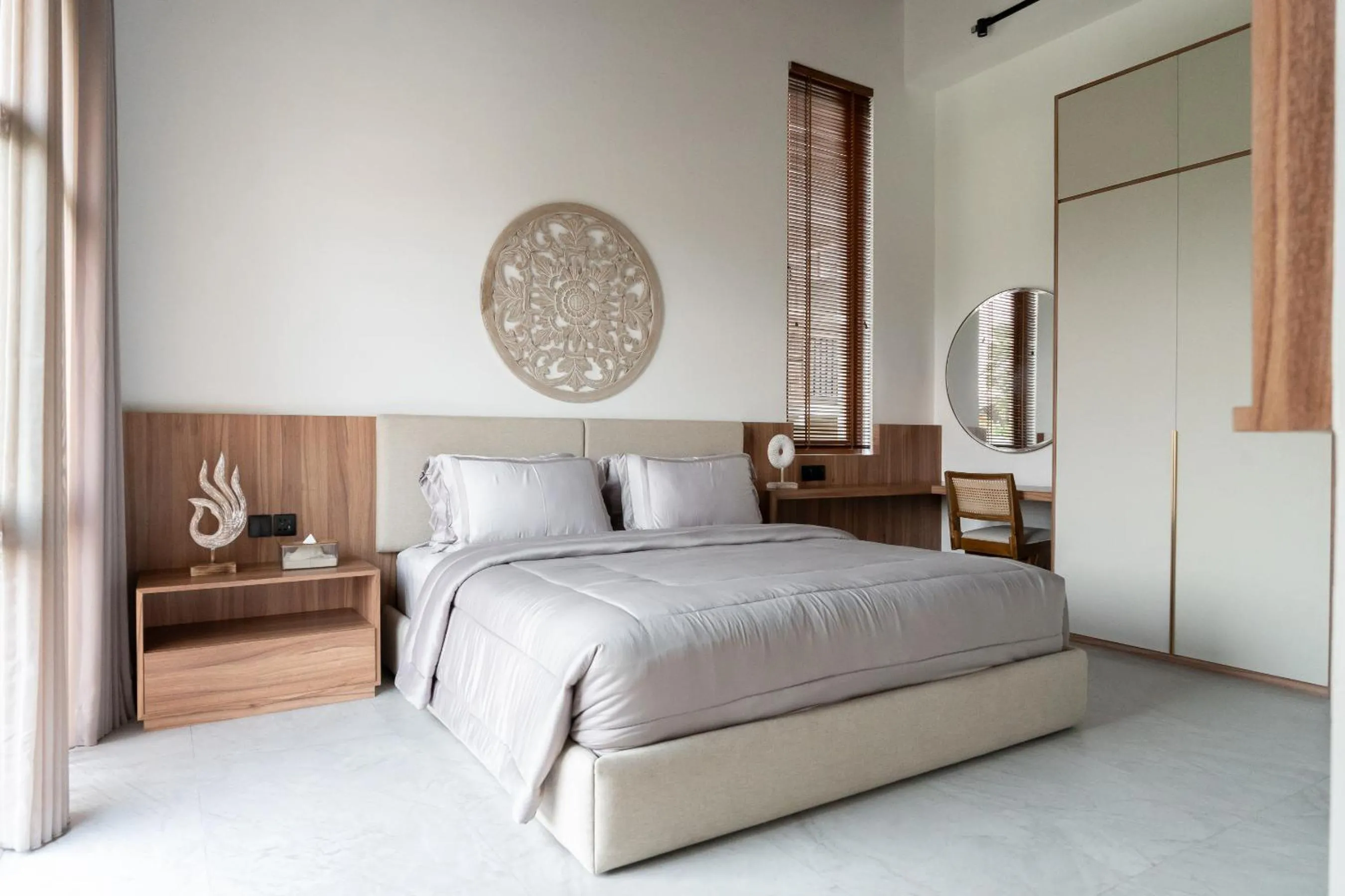 Bed in KammOra Living and Villas