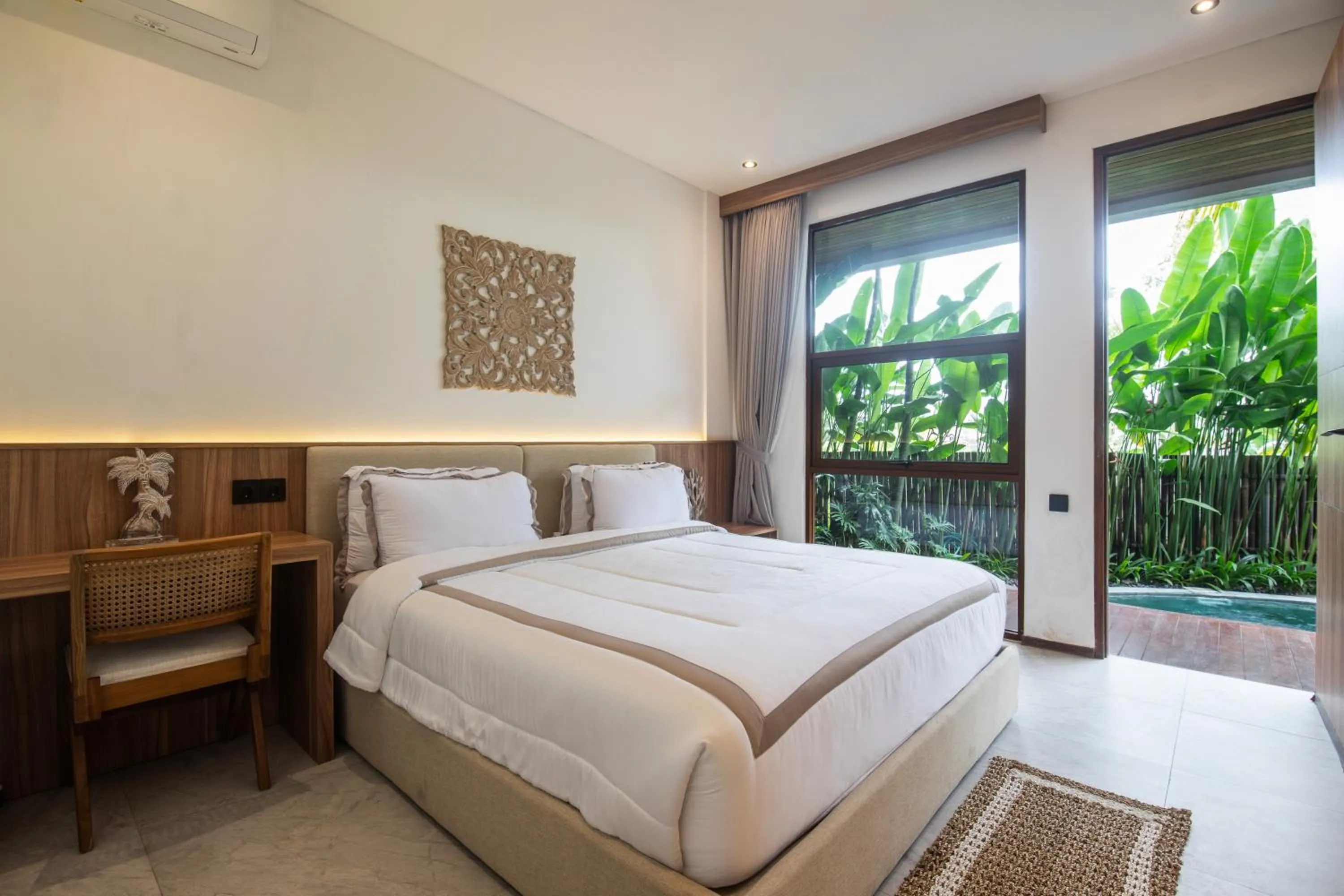Bed in KammOra Living and Villas