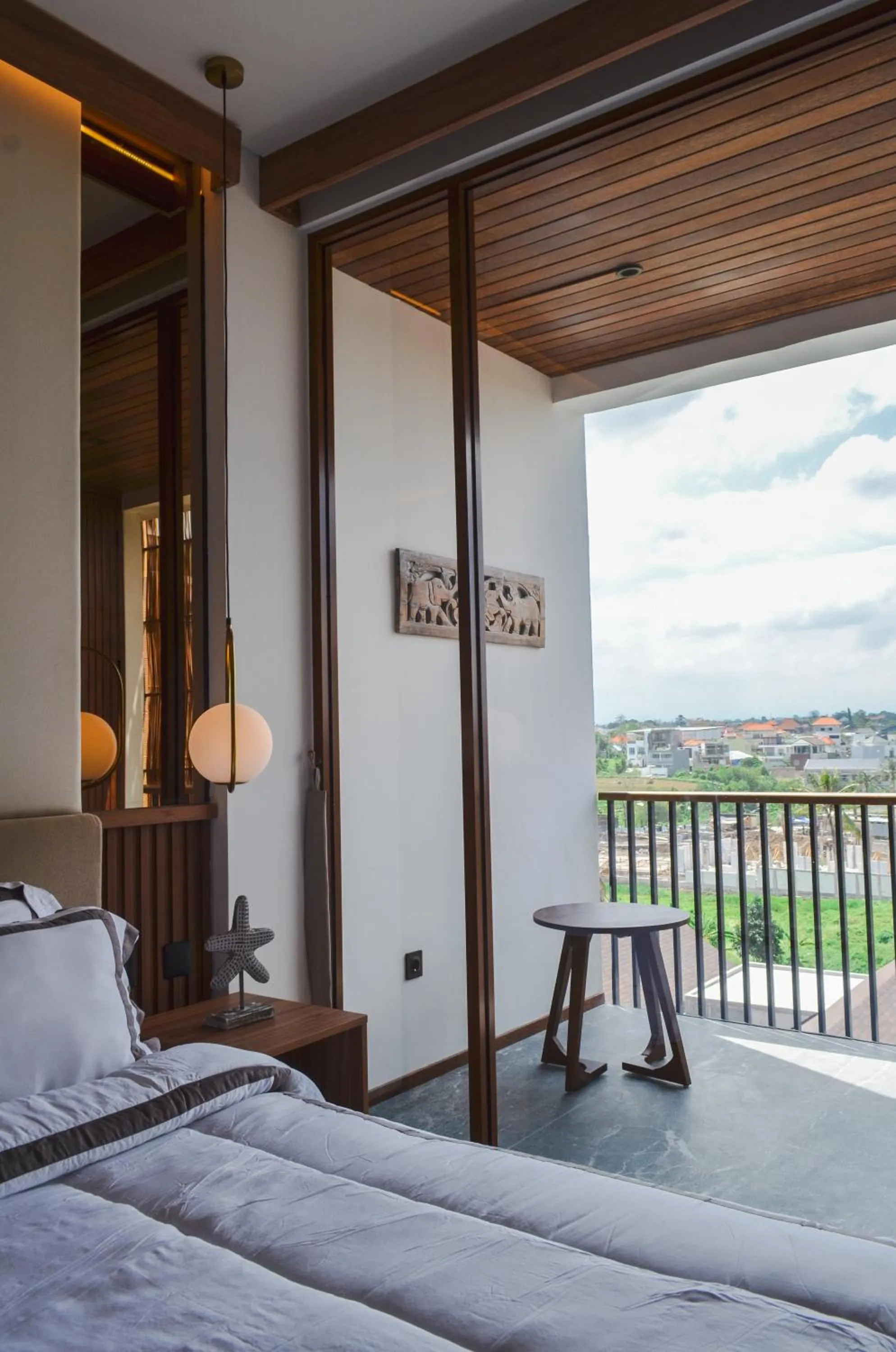 Bed in KammOra Living and Villas