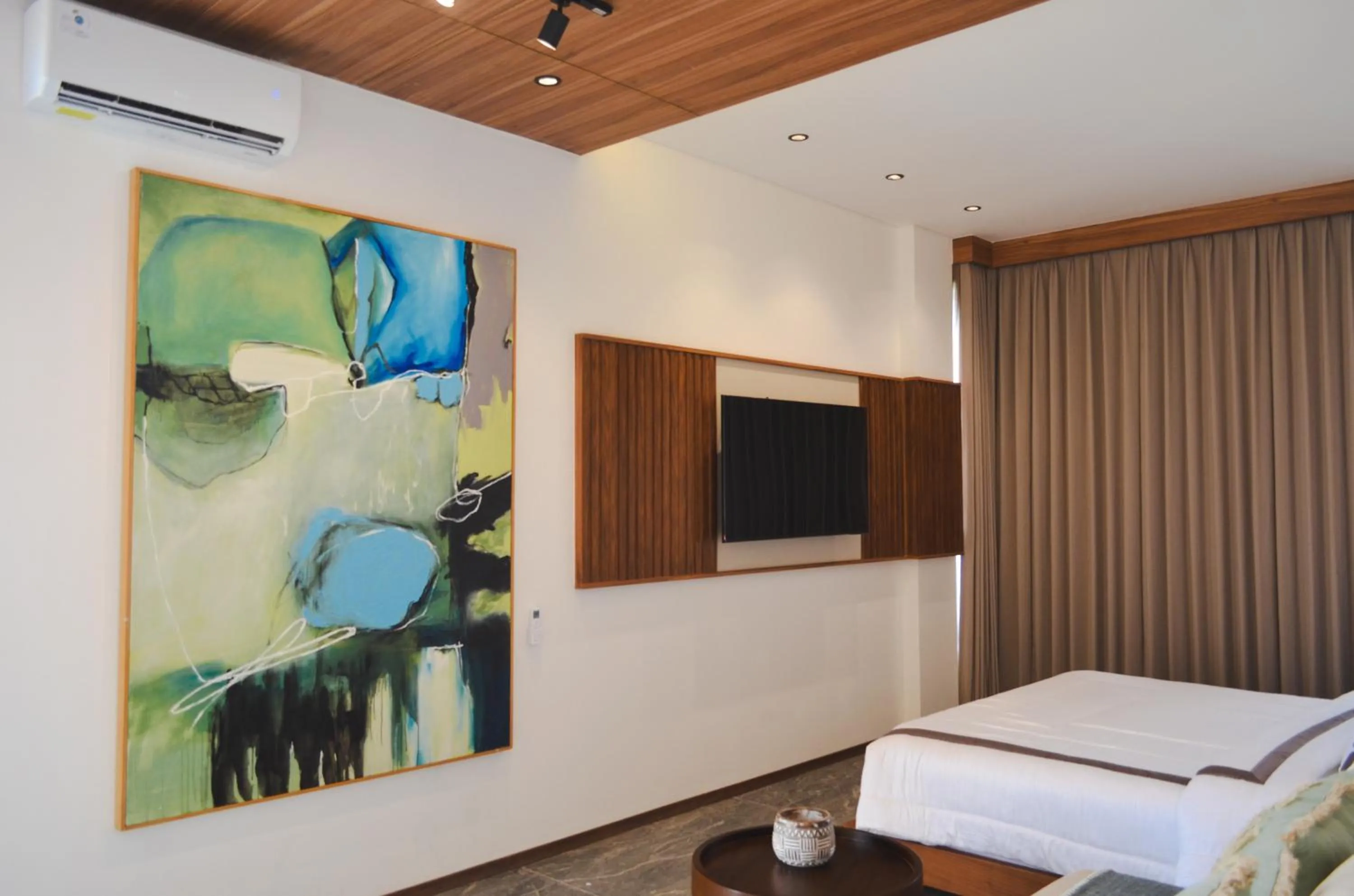 Bed in KammOra Living and Villas