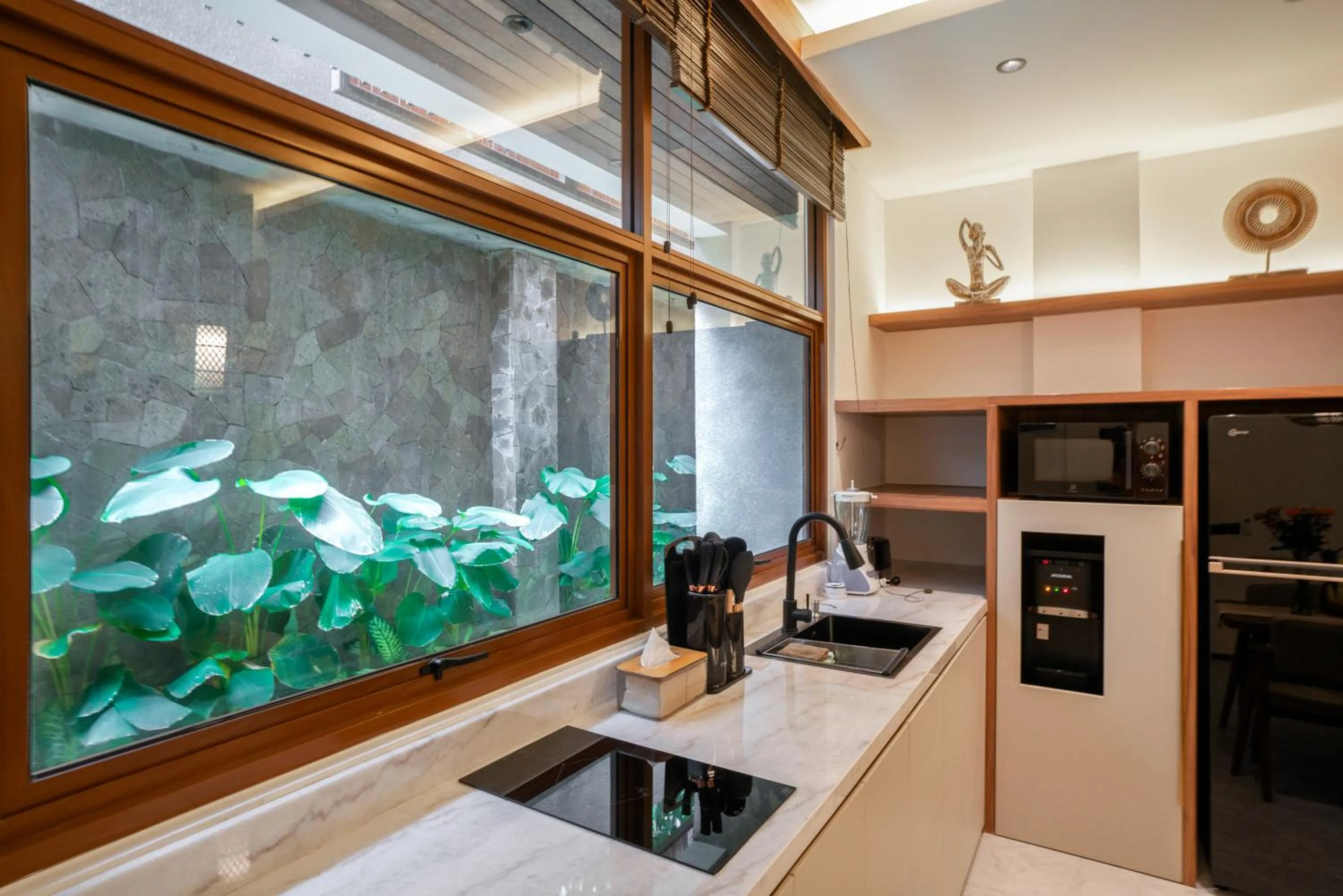 Kitchen or kitchenette in KammOra Living and Villas
