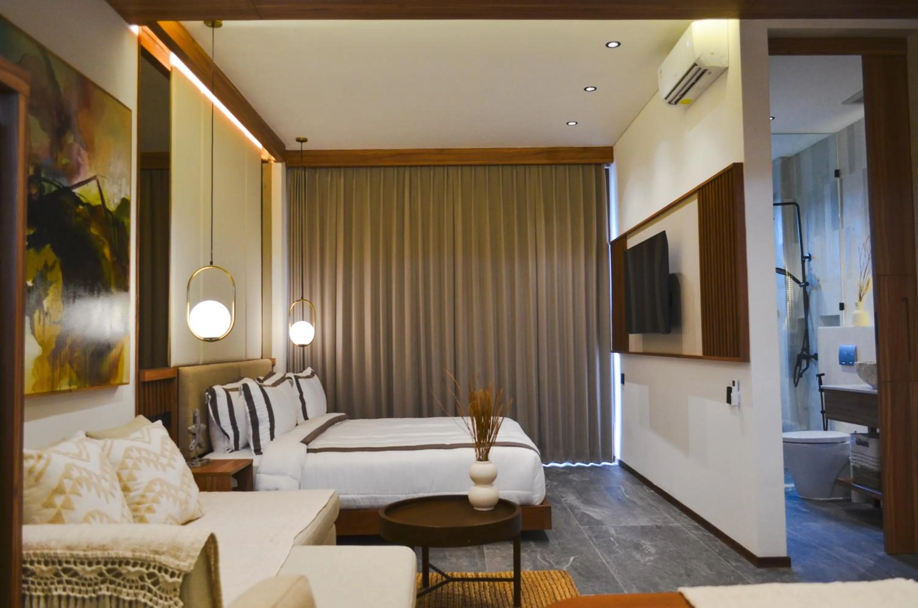 Bed in KammOra Living and Villas