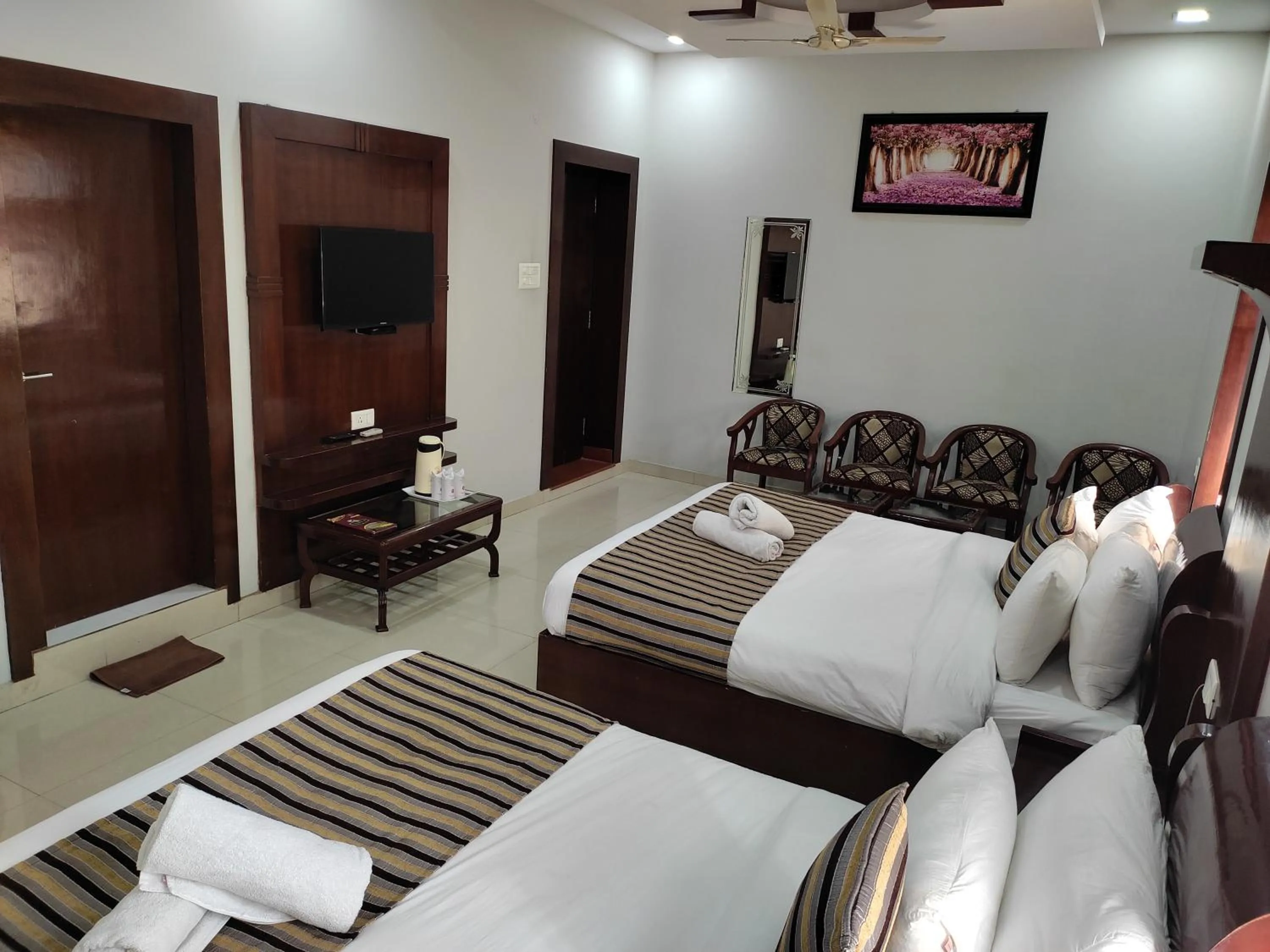 Photo of the whole room, Bed in Hotel Krishna Ji