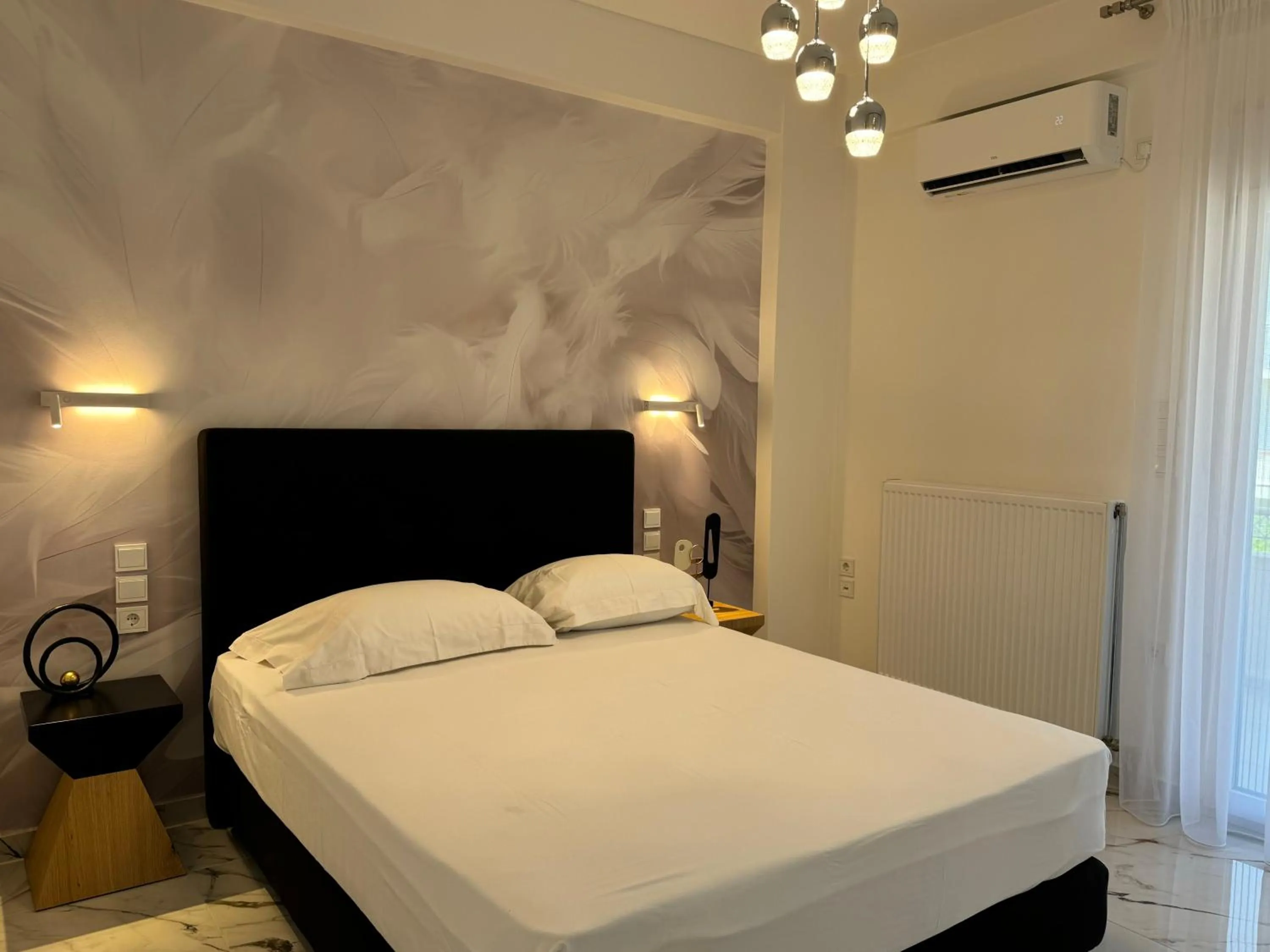 Bed in Madi Luxury Stay Patra
