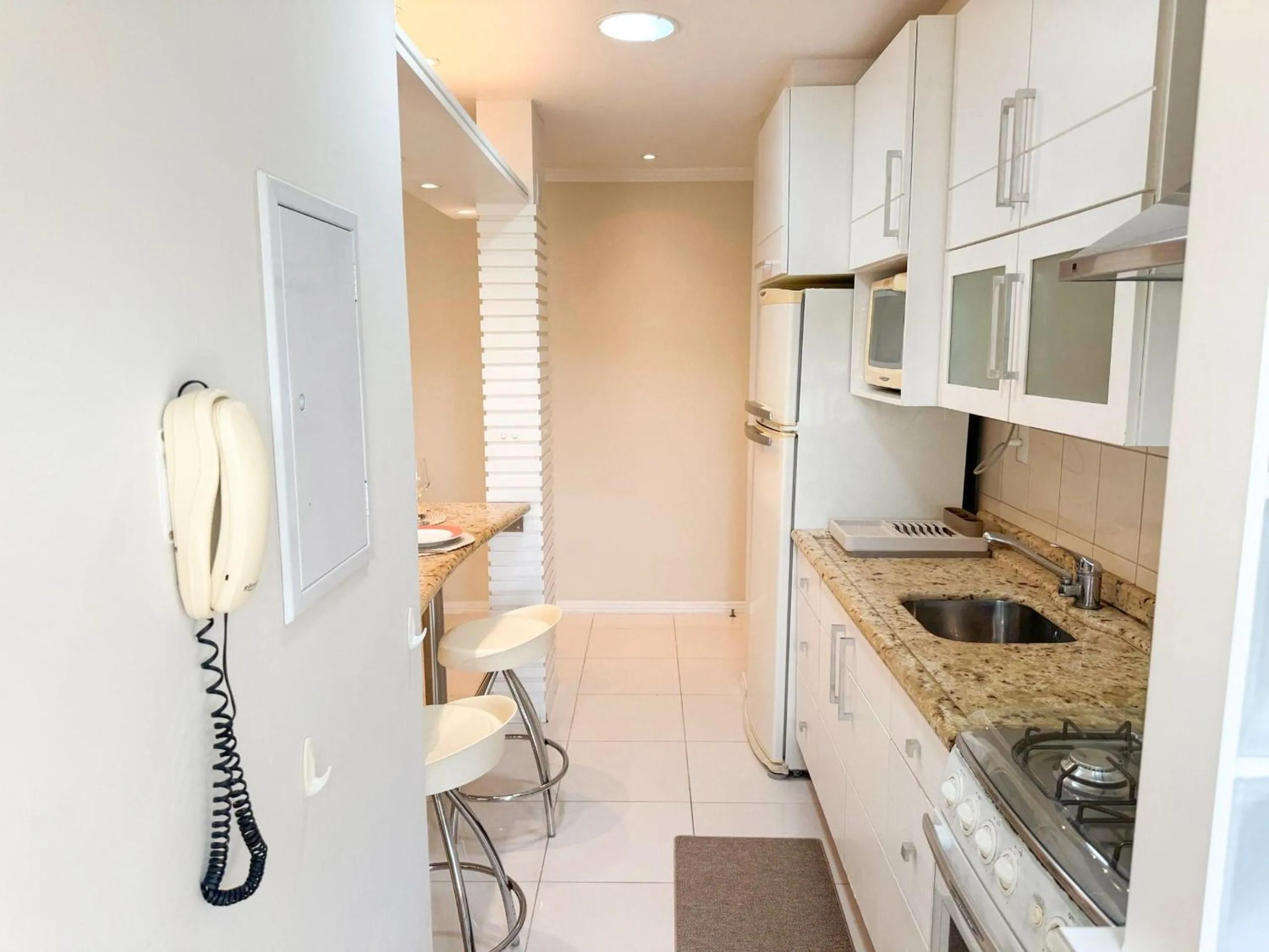 Kitchen or kitchenette in Charme Conforto Jurere Internacional Florianópolis